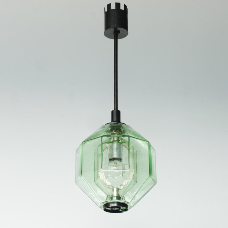 Italian pendant lamp or lantern by Vinicio Vianello for Vistosi, Murano, Italy.
Marked with the labels: Made in Italy Murano and Vistosi.
Dimensions: Total height from ceiling till drop: 22.8 inches (58 cm). Diameter 8.3 inches (21 cm). 
The