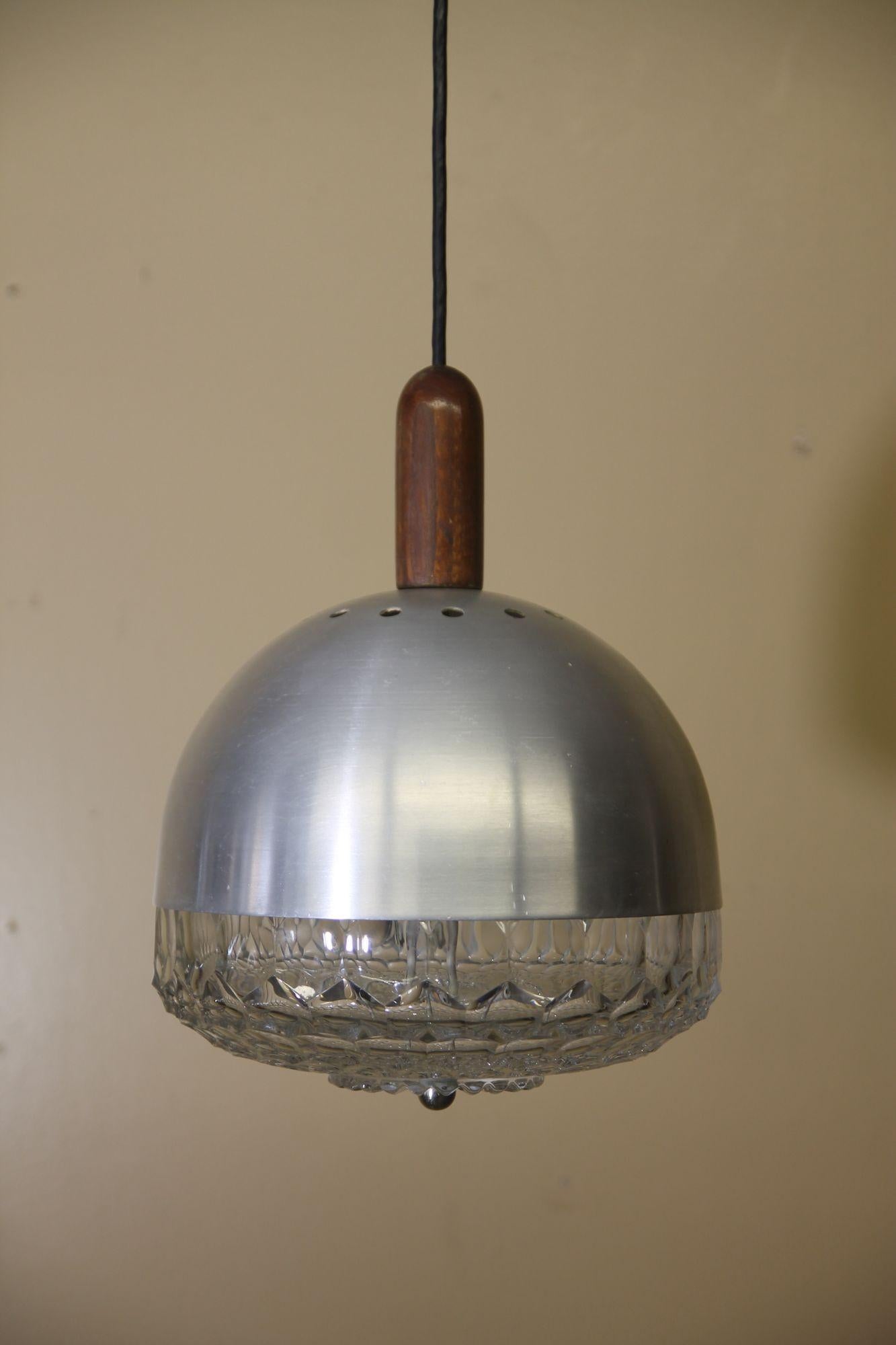 Mid-Century Modern Italian Pendant Light. Light is made with Glass/Aluminum/Wood. For Sale