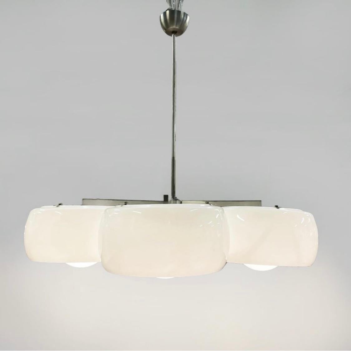 Italian mid-century Pentaclinio chandelier by Magistretti for Artemide, 1970s
Its a very rare ceiling lamp and its not so simple to find in this perfect conditions.
The glass of the ceiling is the original produced in Murano Italy.
Artemide