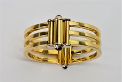 Bracelet manchette italien Pesavento en or jaune avec rubis contemporain