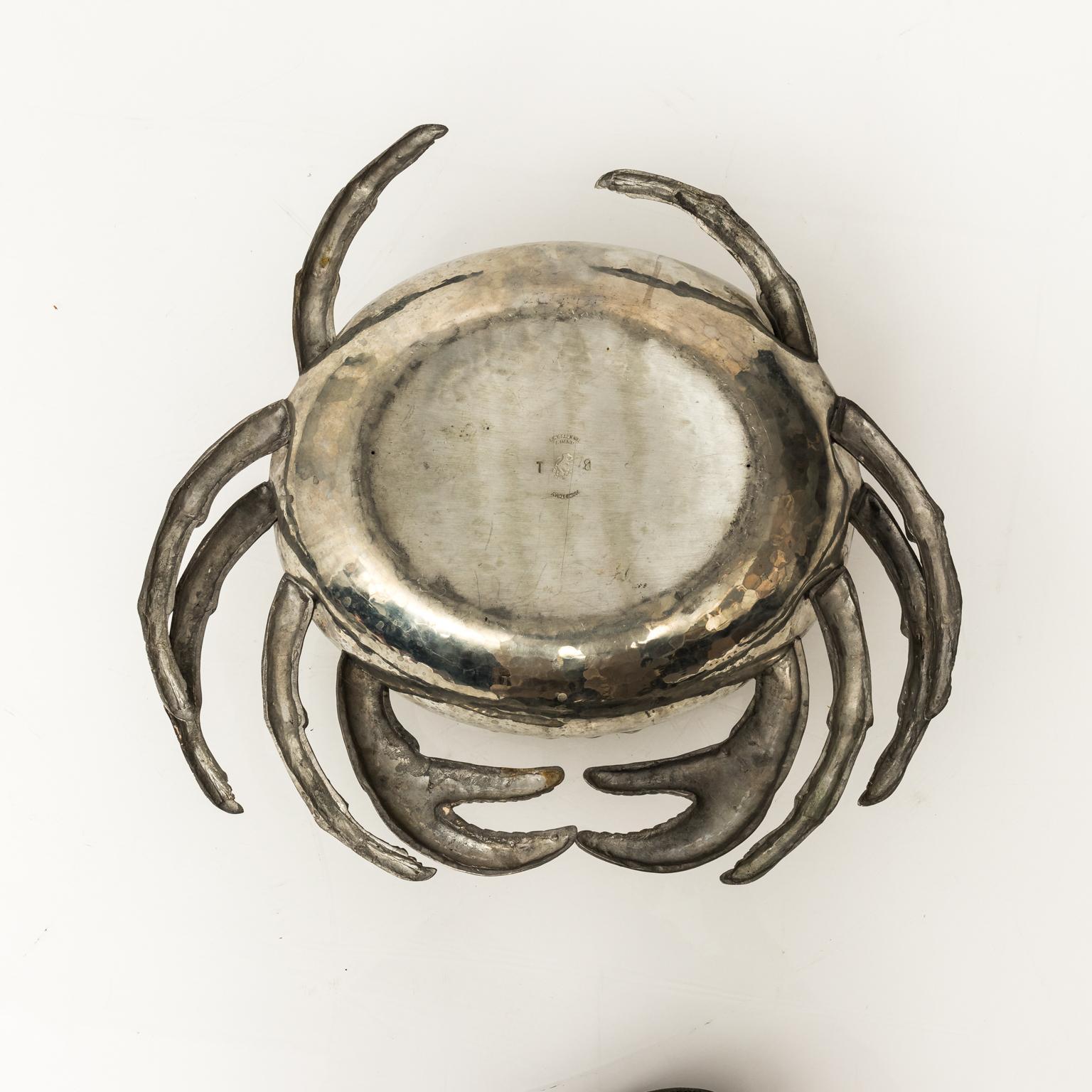 Two-piece hand-hammered pewter figural covered box modeled in the form of a crab, circa 1960. Marked with a 