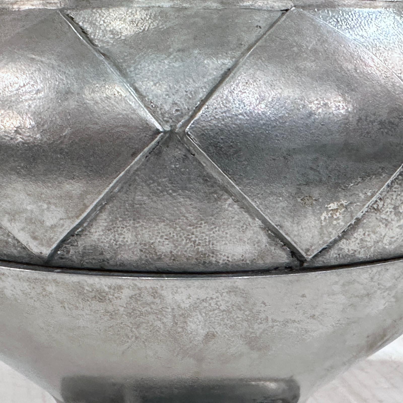 A circa 1950's Italian cast metal lamp with pewter finish and geometric design.

Measurements:
Height of body: 12