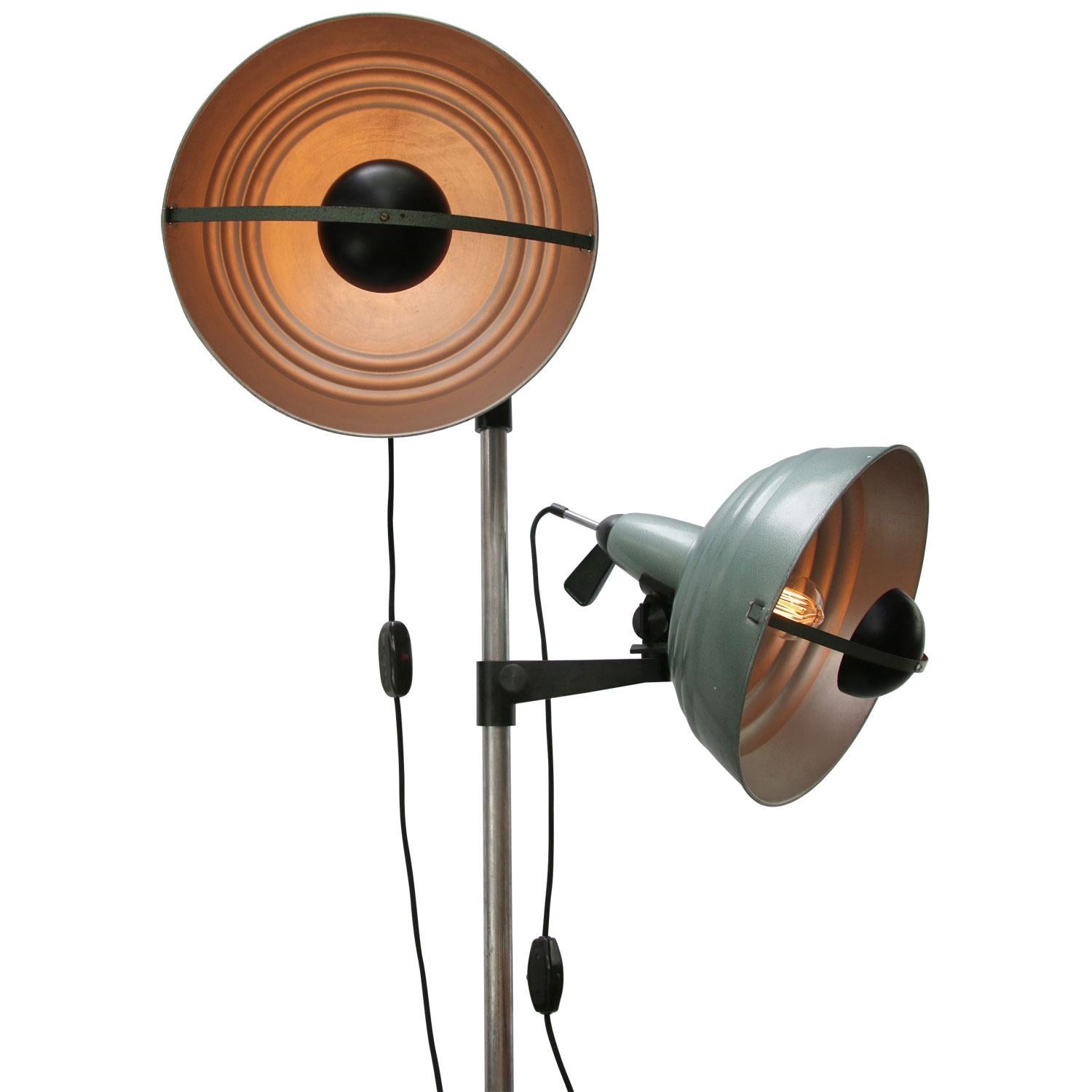 Italian photo Film Studio spot lights on metal stand
Adjustable in height and angle.

Measures: Diameter base 50 cm

Electra wire 4 meter, on/of switch and plugs.

Weight: 8.50 kg / 18.7 lb

Priced per individual item. All lamps have been
