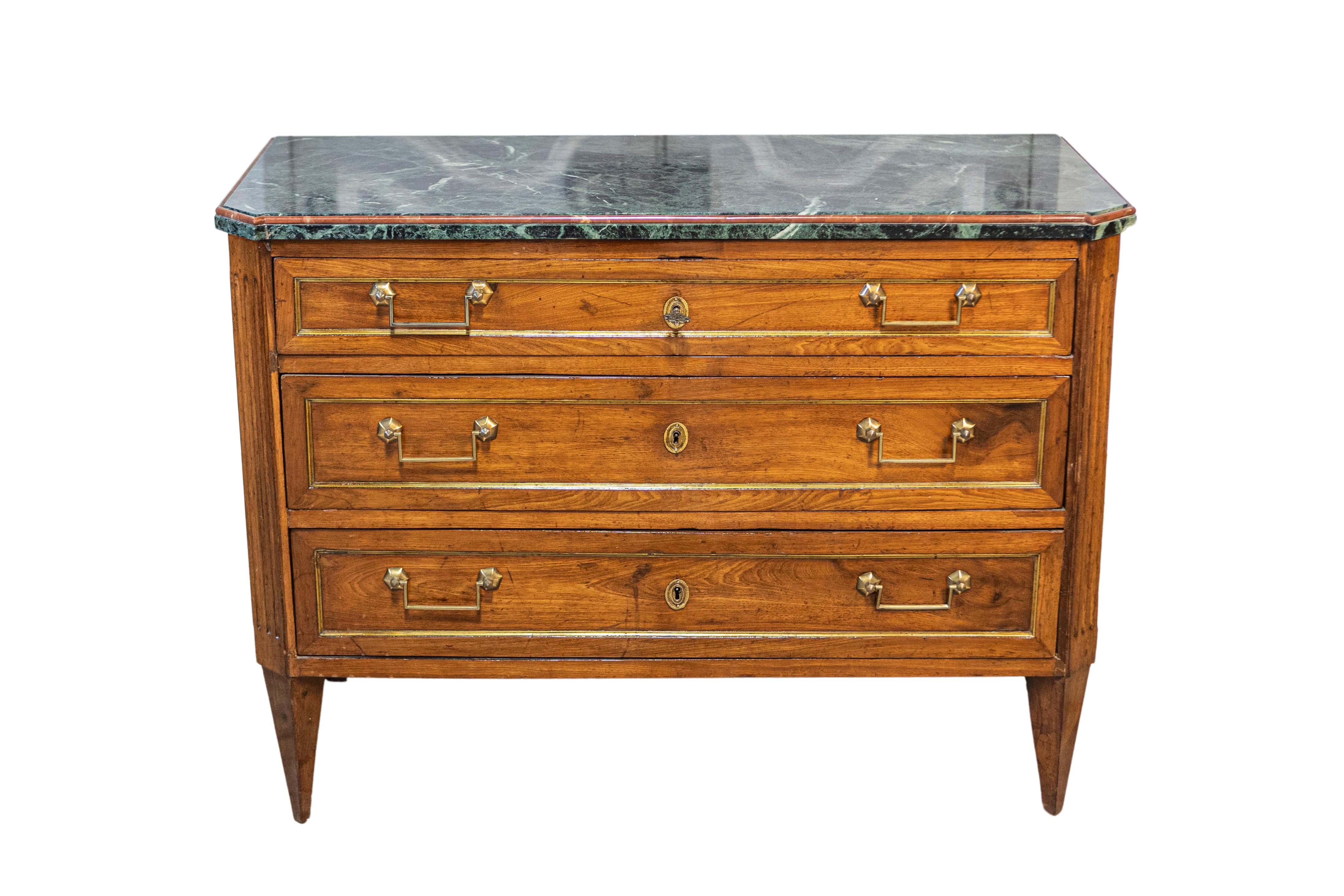An Italian Neoclassical style Piemontese walnut commode from circa 1890 with three drawers and dark green marble top. This Italian Neoclassical style Piemontese walnut commode, dating back to circa 1890, is a testament to timeless elegance and