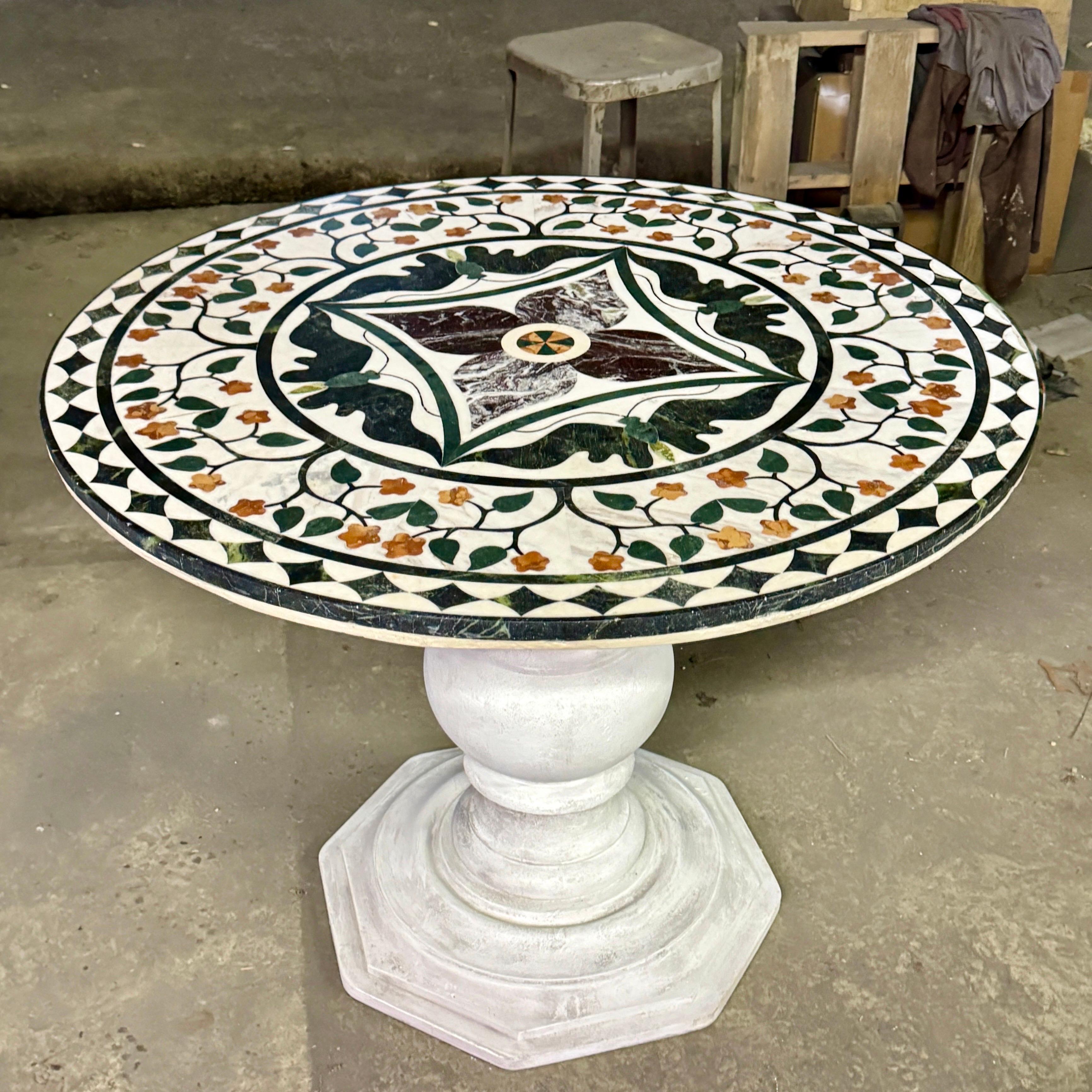 Pietra Dura Inlaid Marble Baroque Style Painted Center Hall Table, Italy.

This stylish round marble table on a solid painted wood base is the perfect addition to any home. Crafted from high-quality inlaid marble, this table is sure to last for