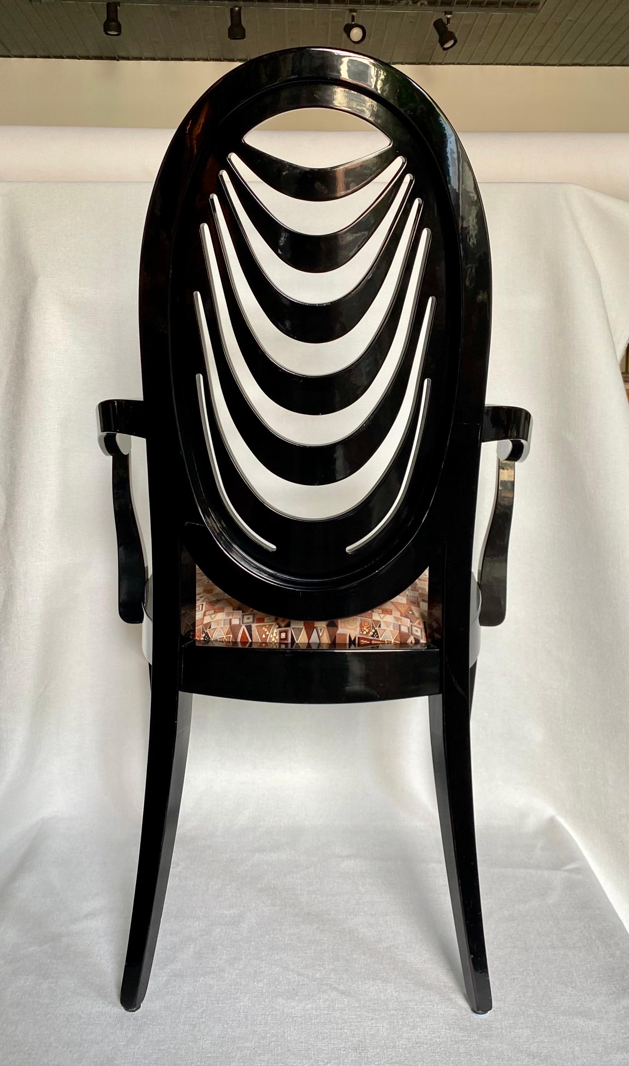 Fabulous Hollywood Regency Style Italian black lacquer armchair designed by Pietro Costantini for Ello Furniture. This sculptural accent or desk chair features a graphic draped back with curved cabriole legs. Original gloss black lacquer finish and