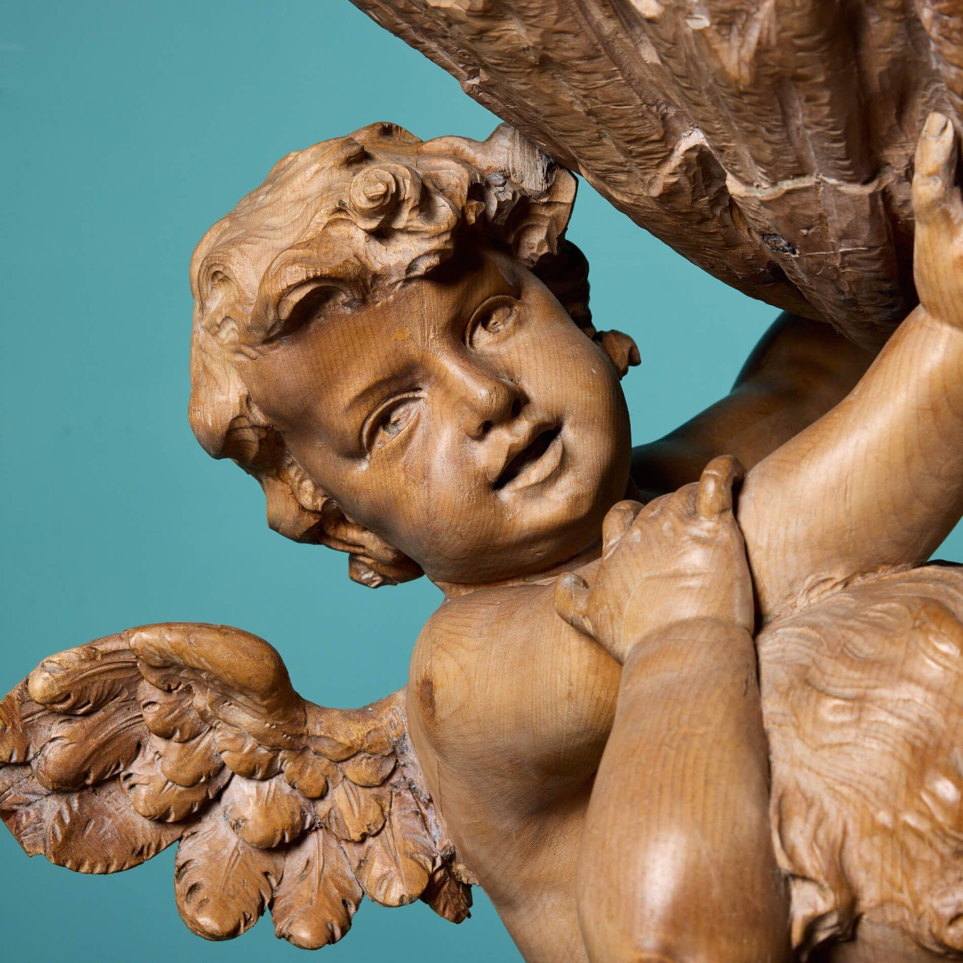 Baroque An Italian Hand Carved Pine Putti Statue For Sale