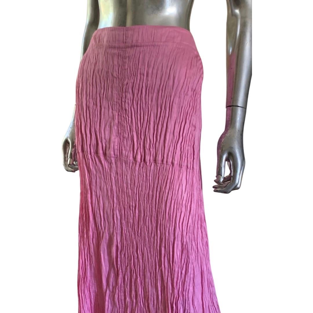 A beautiful crush pink skirt by Italian company 120% Lino. They use the same teqhnique as Fortuny and Mary McFadden pleating. Purchased in Italy. Never worn. Side pockets. Great movement when worn. Linen and nylon blend. Marked size 48, Italy. See