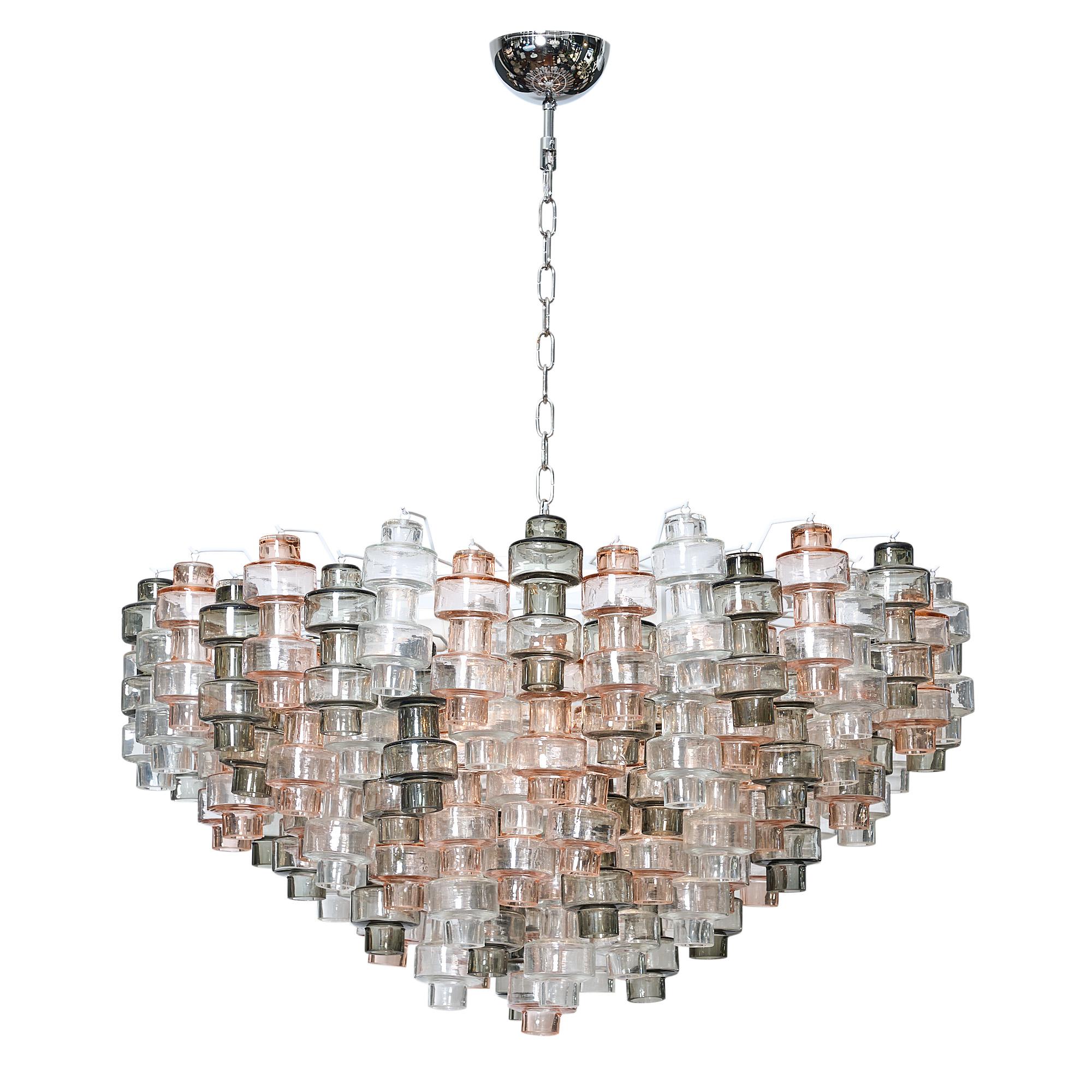 Fantastico! From the most prominent company in Murano, this is the pink and grey Manubri (dumbbells in Italian) Murano glass chandelier. Each component is hand-blown individually to create this organic and spectacular fixture. We couldn’t resist the