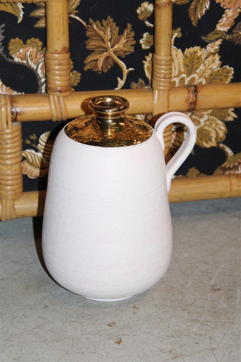 High quality ceramic vase with liquid gold 24kt probably manufactured by Bitossi Aldo Londi.