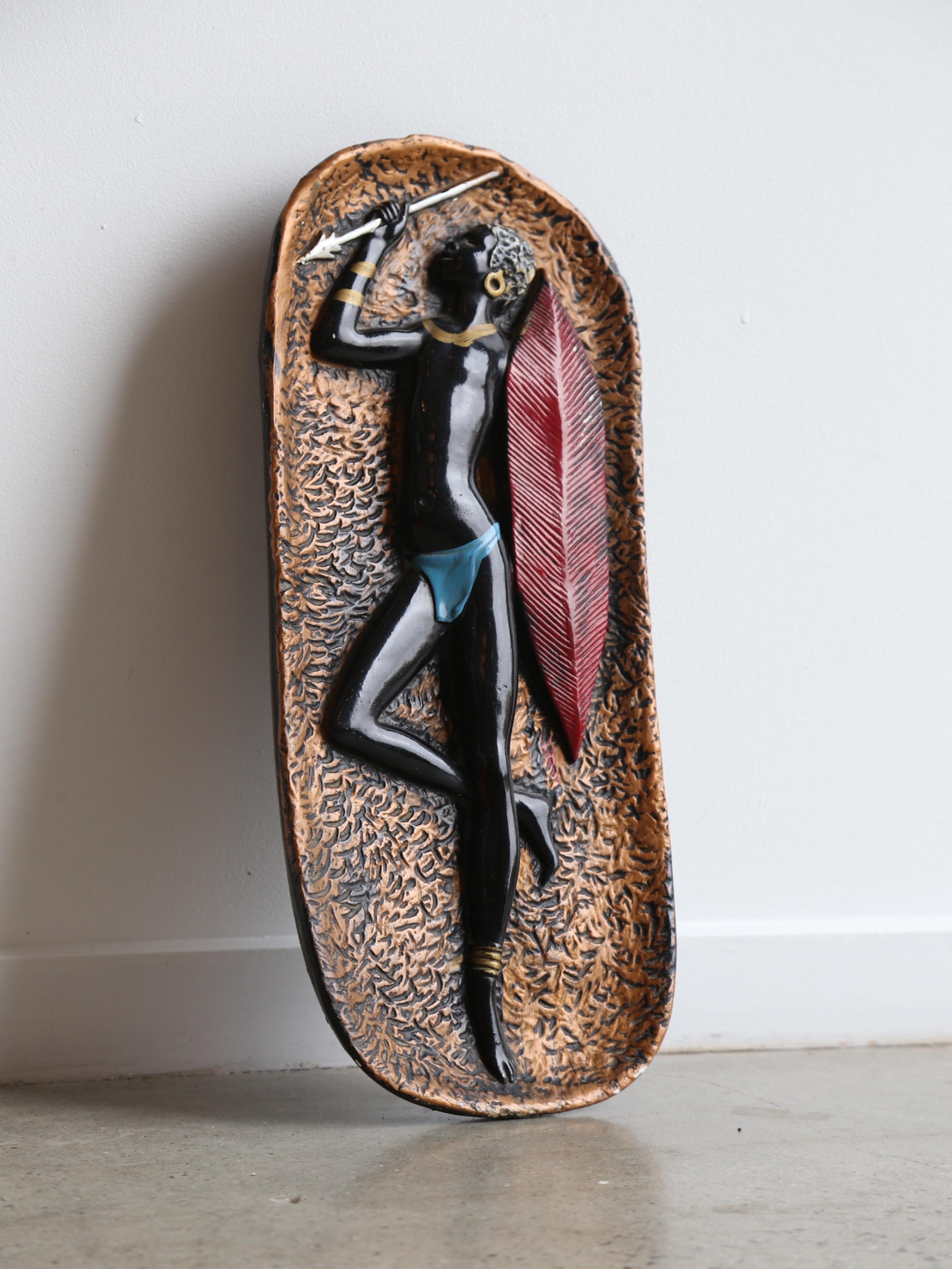 The Italian 1950 plaster wall decoration of an African dancer is a beautiful and unique piece of art from the mid-20th century. The decoration is made from plaster, a material that has been used in art and architecture for centuries, and it is a