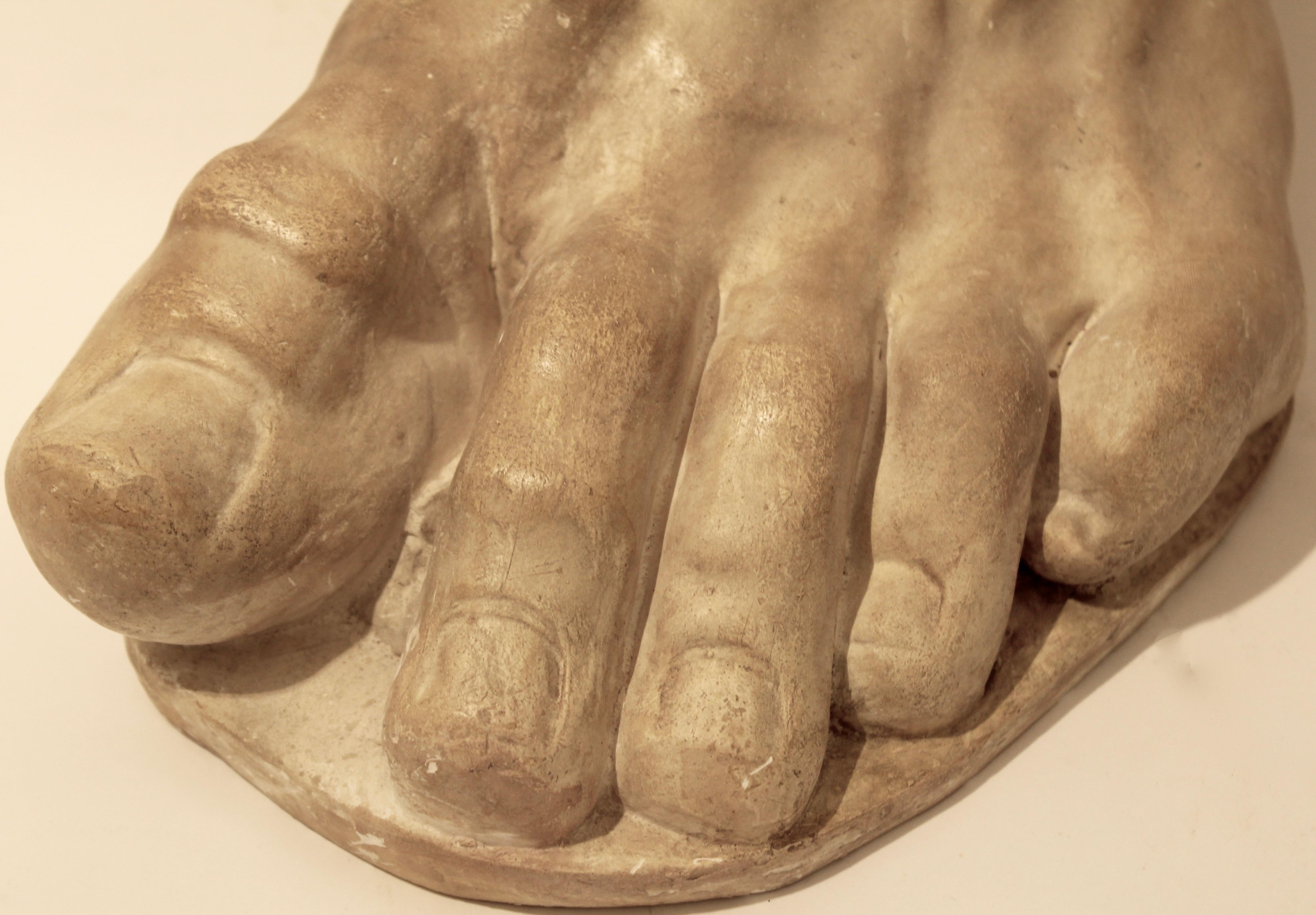 Italian plaster sculpture depicting the foot of the emperor Constantine, circa 1950. The cast represents a fragment of Colossus of the Constantine, a large statue of the late Roman emperor Constantine the Great dated circa 312-15. Widely considered