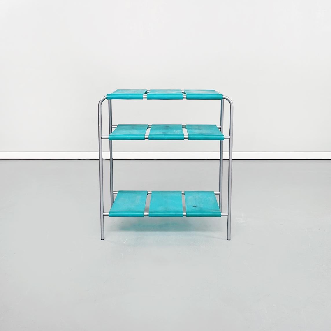 Italian plastic and metal coffee table by De Pas, D'Urbino and Lomazzi for Quattrocchi, 1980s
Coffee table composed by 3 rectangular tops, made up of 3 thick strips of bright aqua green-blue plastic. The structure is in tubular metal.
Produced by