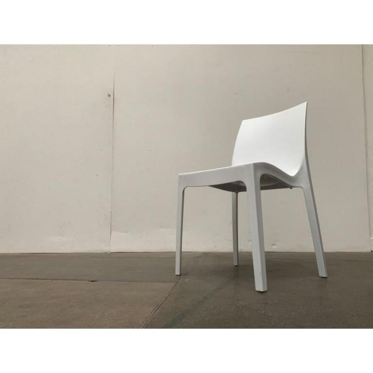 Italian Plastic Rome Stacking Chair, in Very Good conditions. Designed 1990 to 1999 This piece has an attribution mark.
 
Additional information:
Materials: Plastic
Styles: Minimalist
Country of Origin: Italy
Color: White
Item Type: Vintage, Antique
