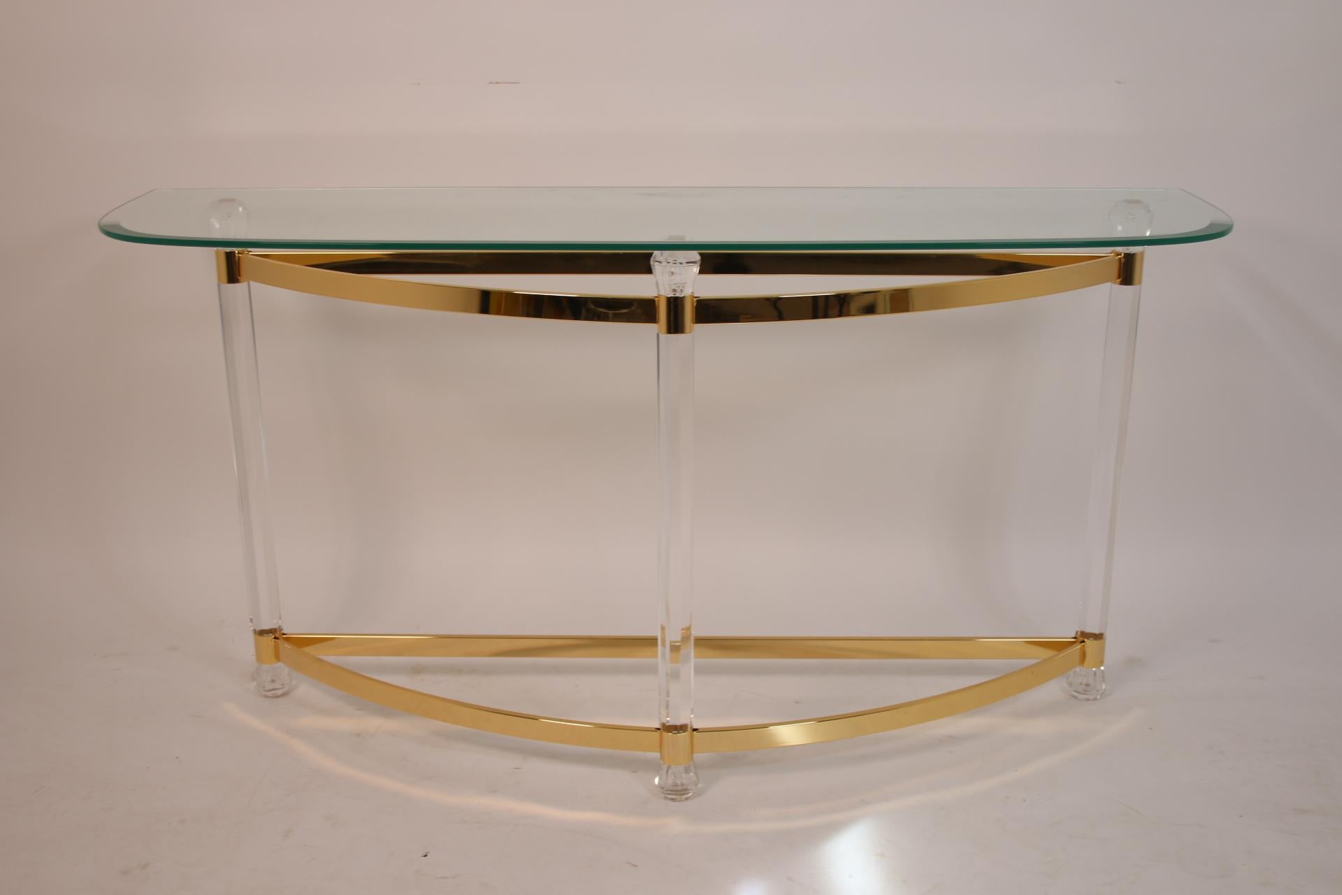 Italian Plexiglass Side Table Crescent Moon Hollywood Regency


Plexiglass table with gold accents, the table top has the shape of a crescent moon.

The top has a slightly darker transparent appearance, which makes the plexiglass frame stand