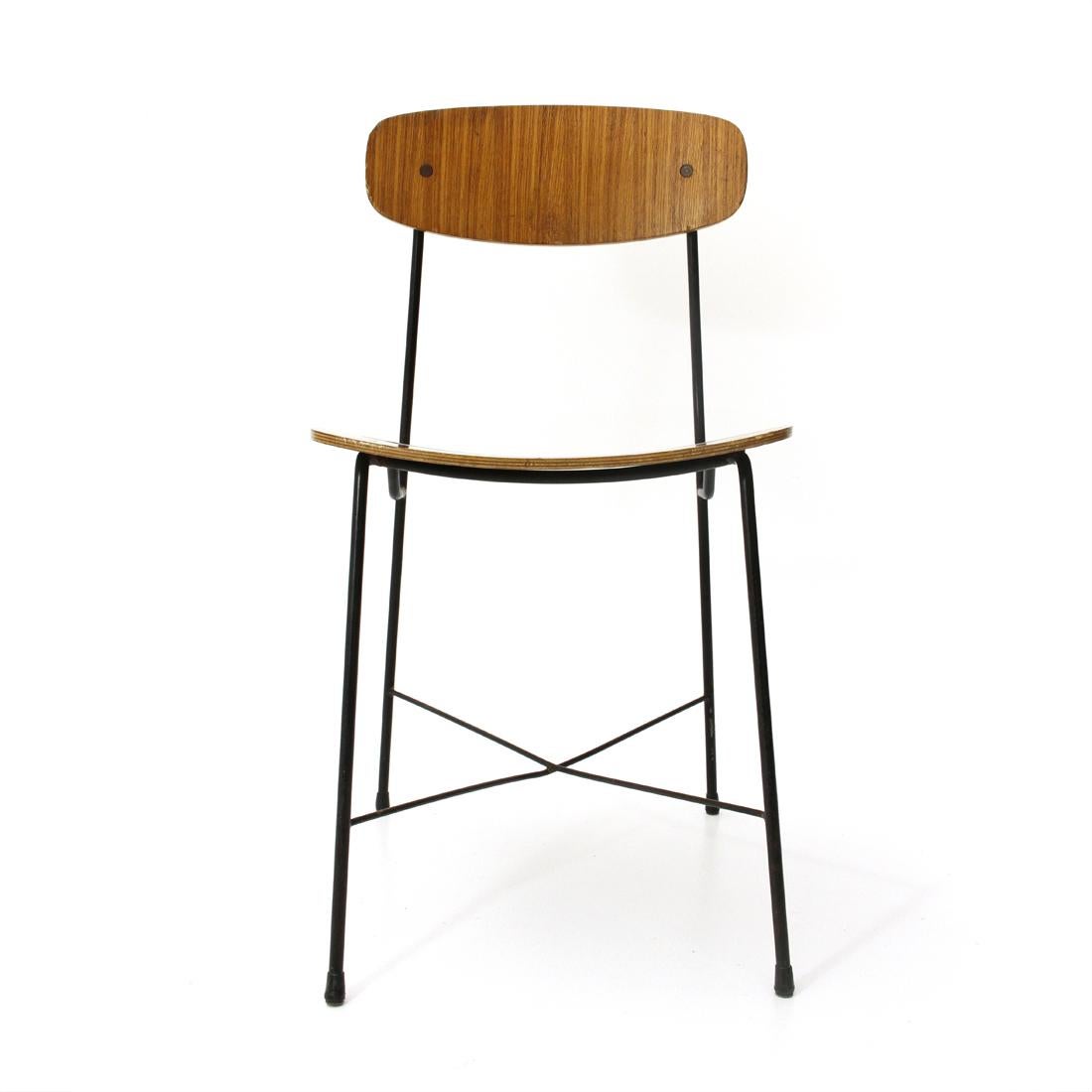 Chair in bentwood produced by Faram on George Coslin design in the 1950s.
Structure in black painted metal, shell in hot curved plywood.
Good general conditions, some signs due to normal use over time.

Dimensions: Width 43 cm, depth 45 cm,