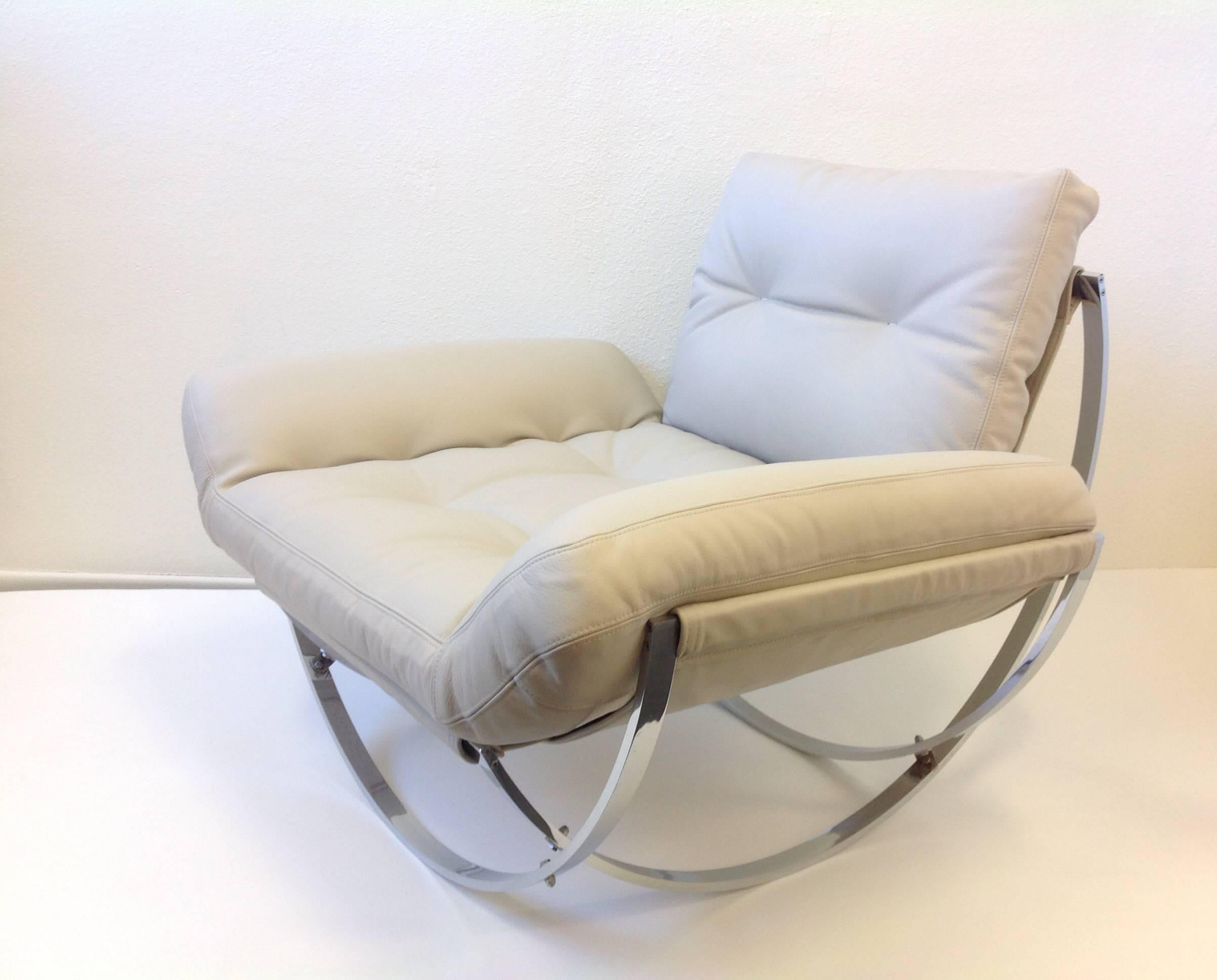 Late 20th Century Italian Polish Stainless Steel and Leather Lounge Chair and Ottoman