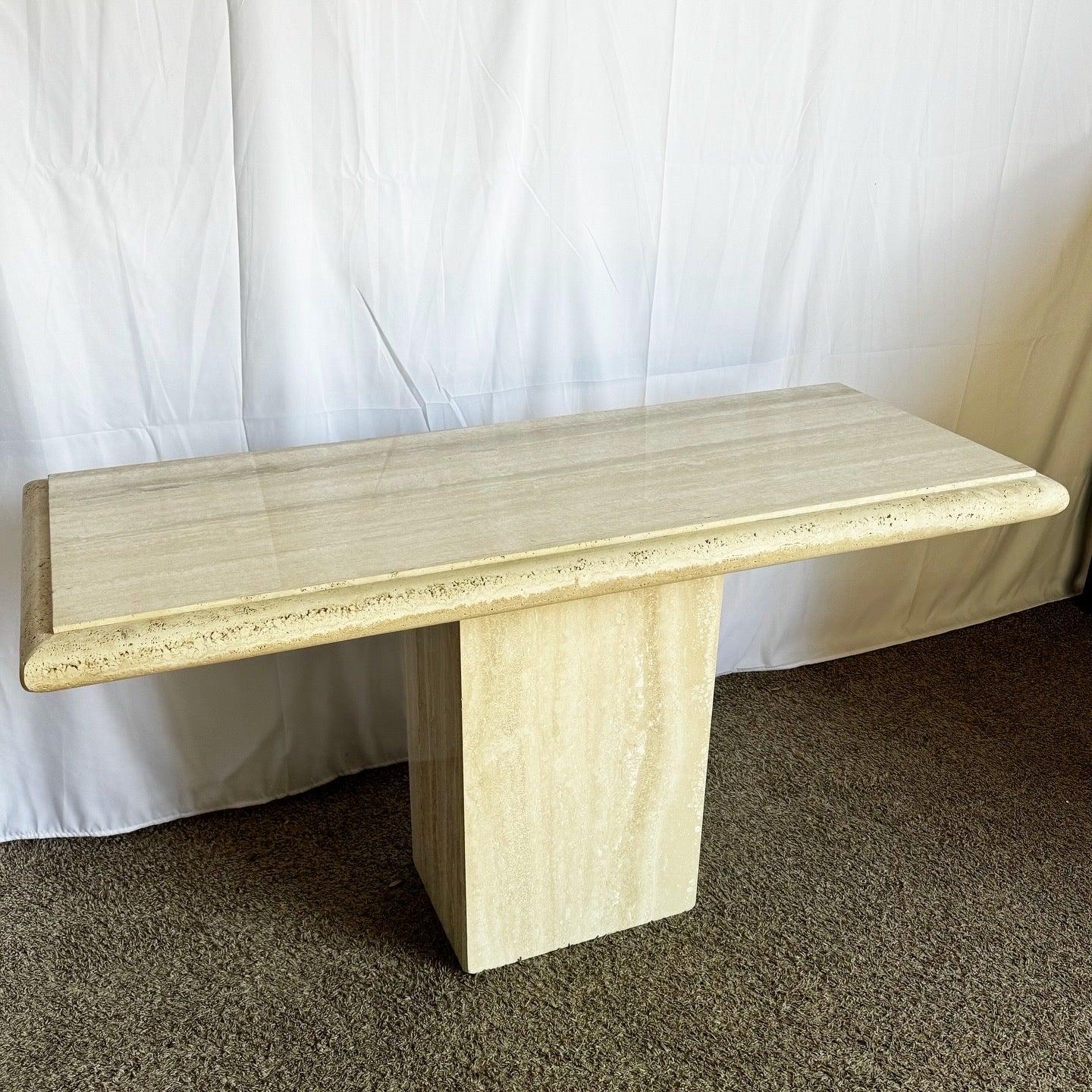 Italian Polished Travertine Console Table from the 1970s, featuring a filled and polished surface with bullnose edges, exemplifying timeless elegance.
 
 One small chip on one of the corners as shown in the photos.
 
 We sell items as acquired,