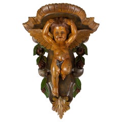 Italienische polychrome italienische Wandhalterung aus Holz mit geschnitztem Cherub-Engel