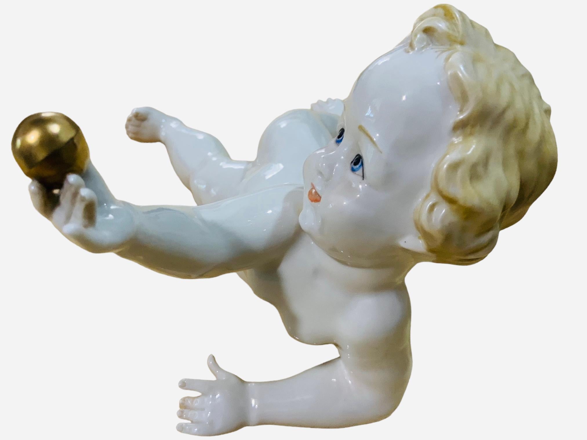 Italian Porcelain Baby Boy Piano Figurine For Sale 3