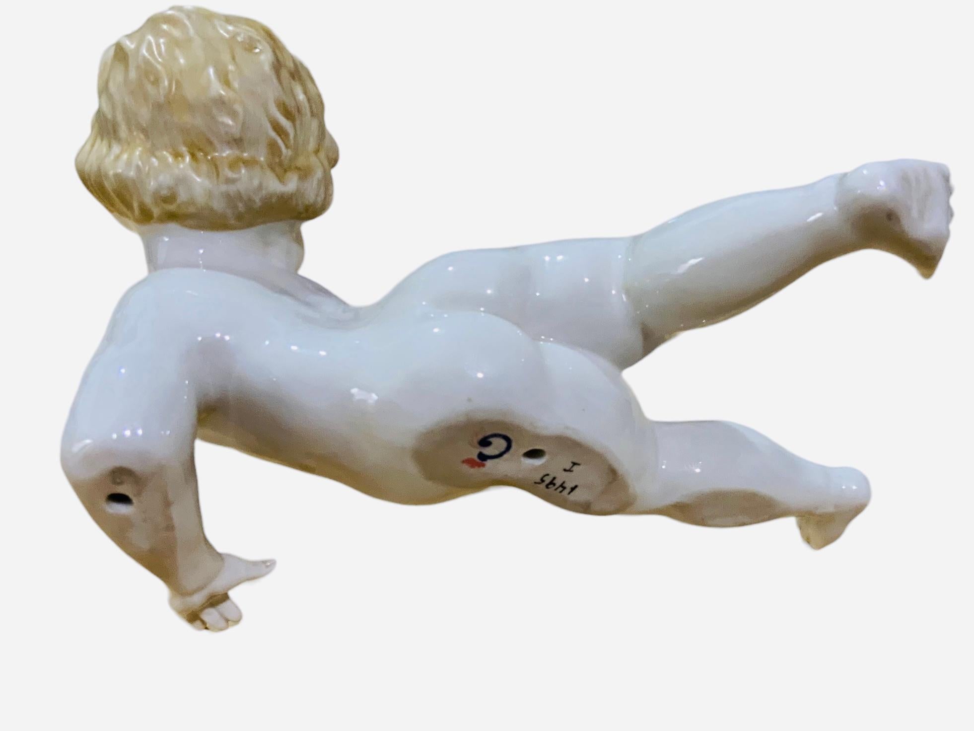 Neoclassical Italian Porcelain Baby Boy Piano Figurine For Sale
