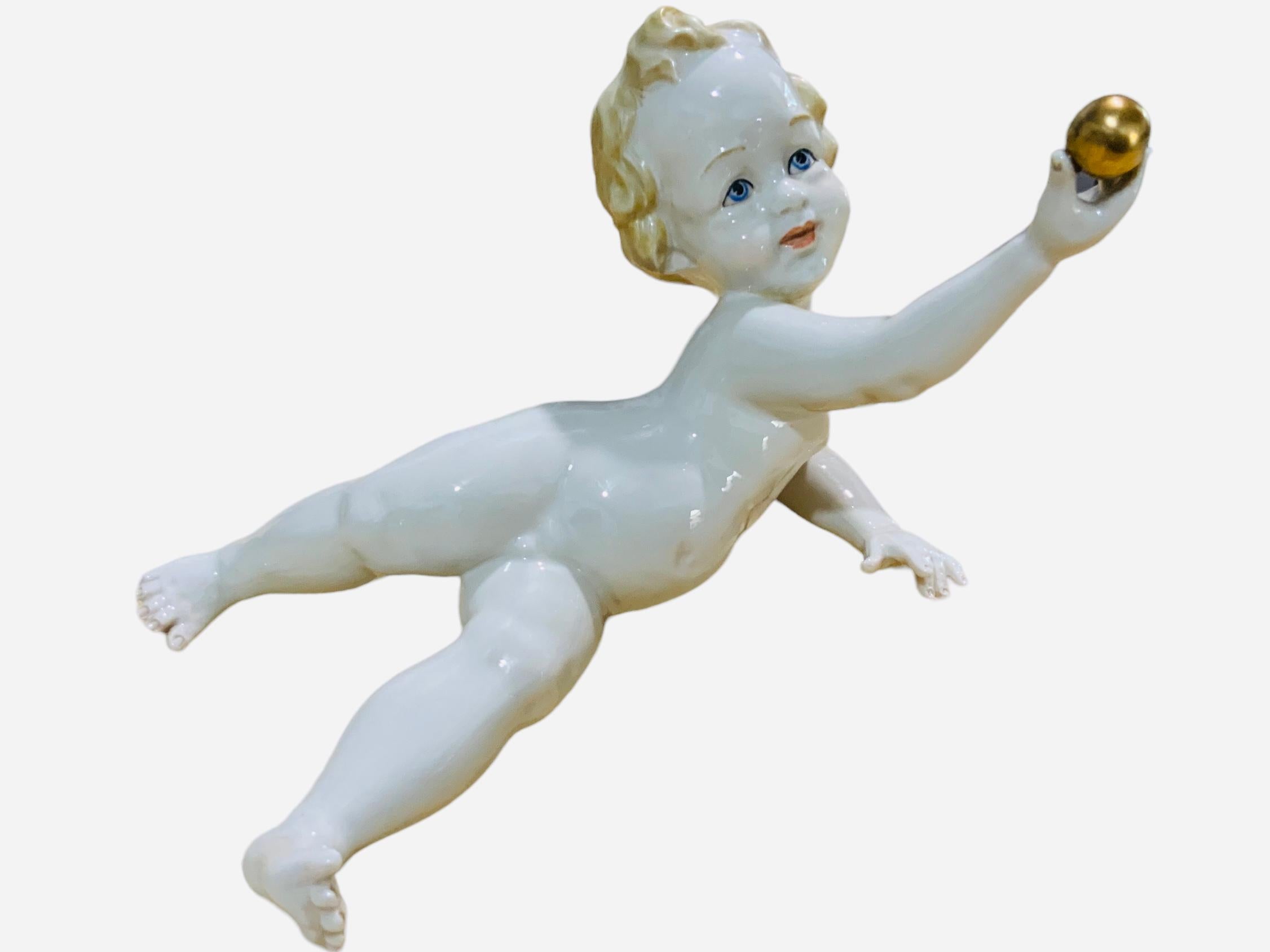 Hand-Painted Italian Porcelain Baby Boy Piano Figurine For Sale