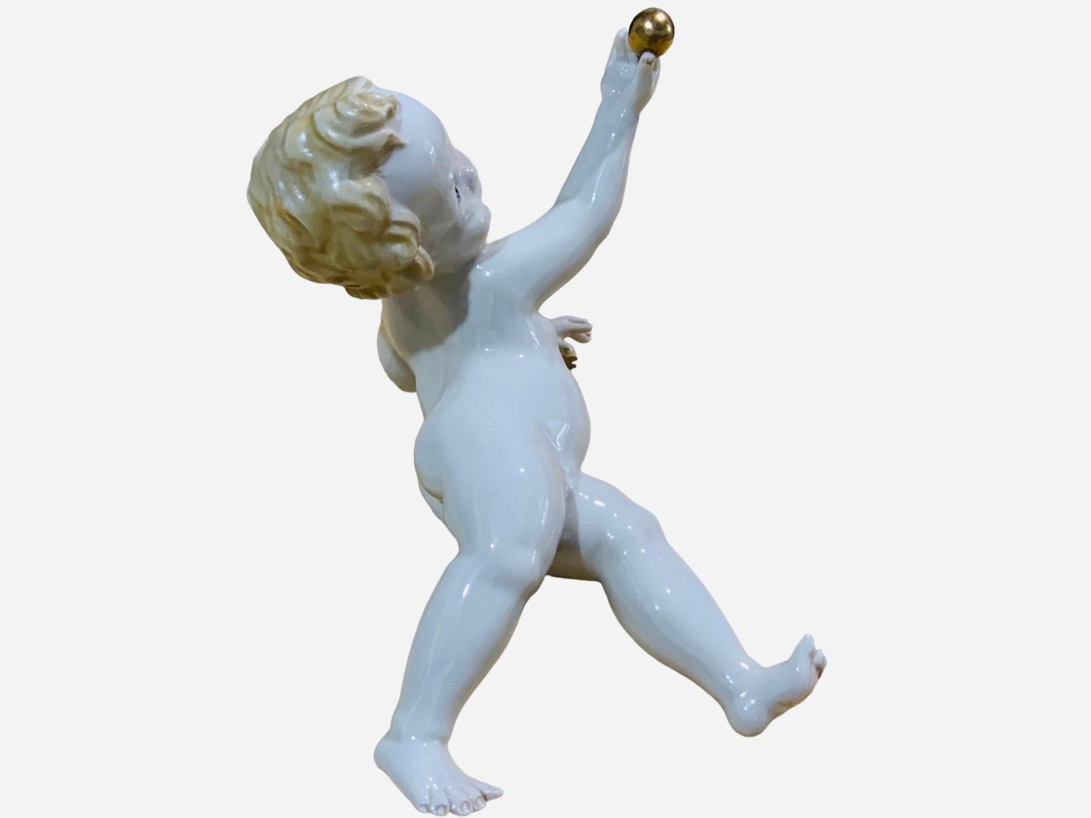 20th Century Italian Porcelain Baby Boy Piano Figurine For Sale