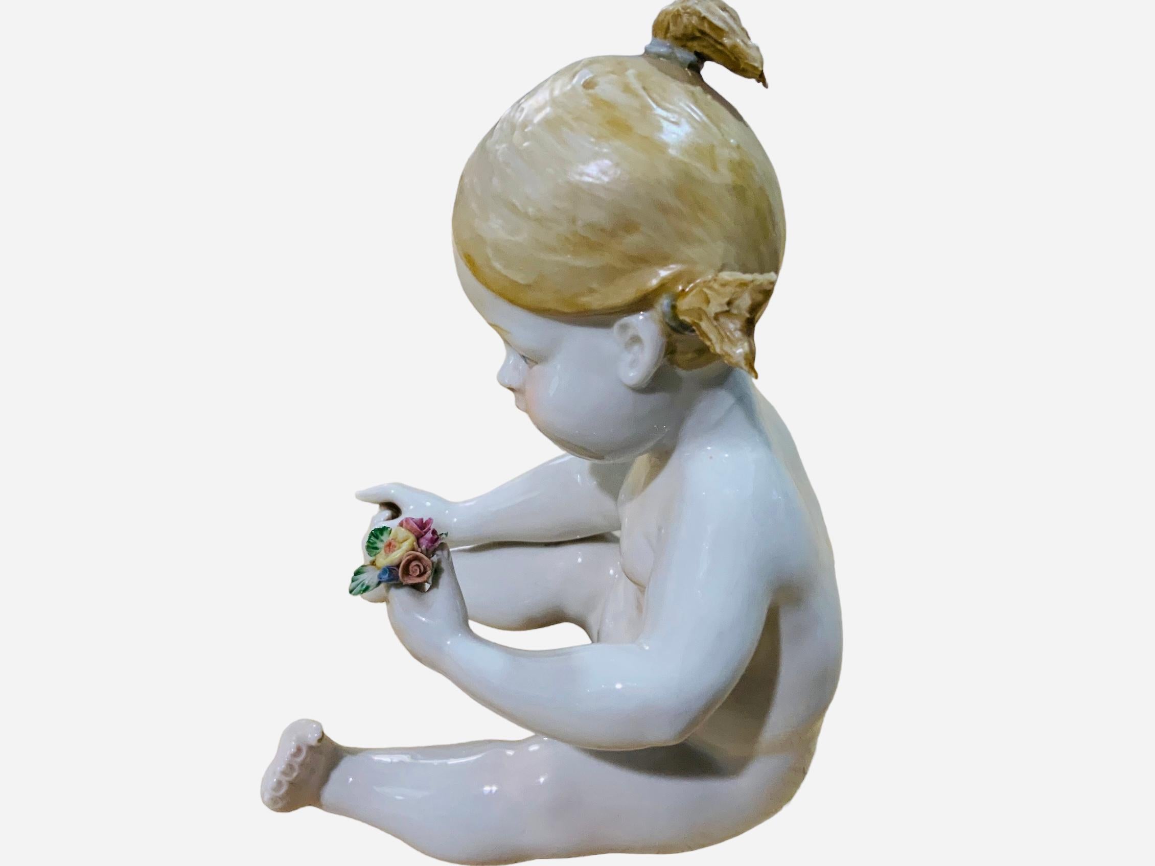 20th Century Italian Porcelain Baby Girl Piano Figurine For Sale