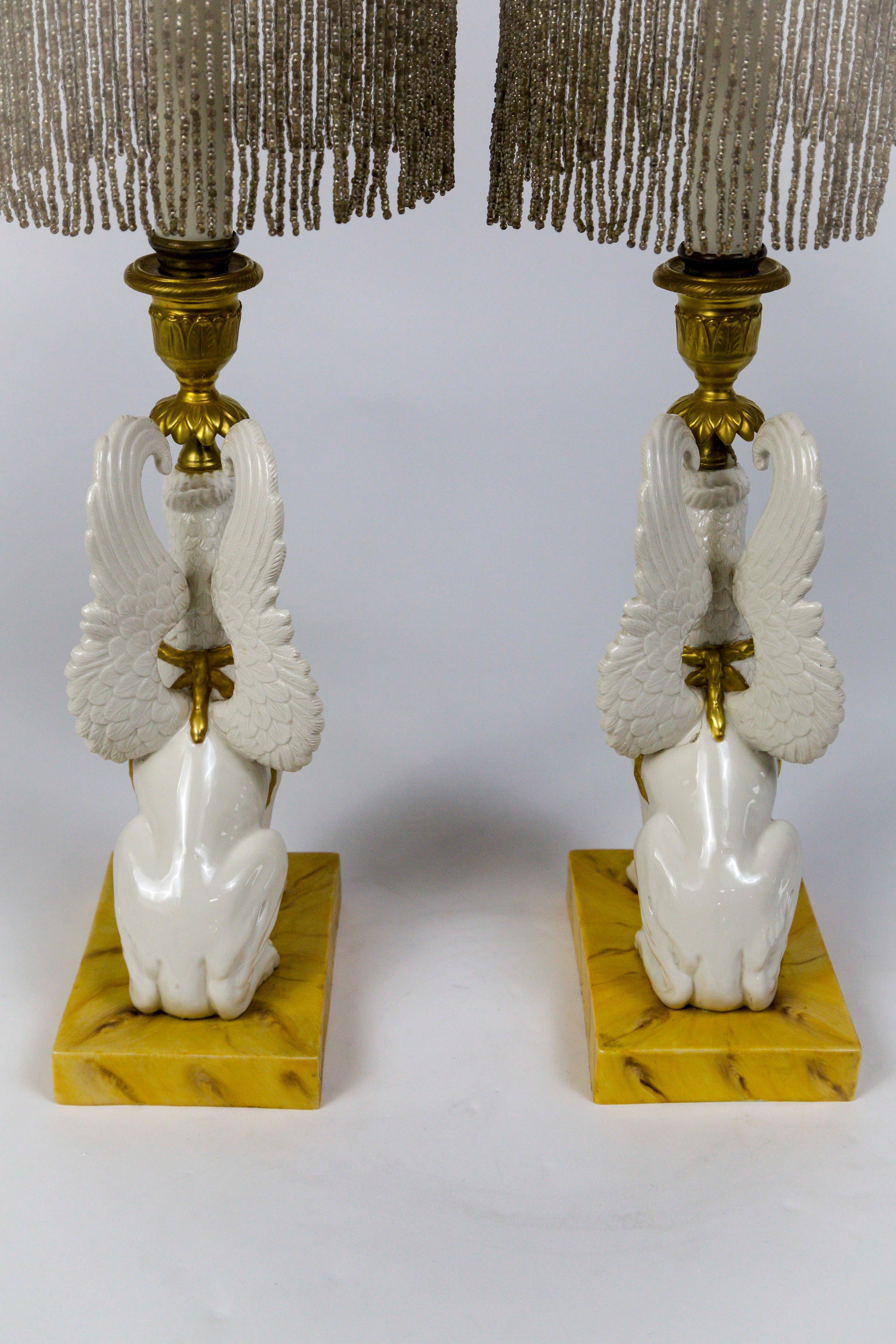 Brass Pair of Italian Porcelain Griffin Push-Up Candlesticks with Beaded Shades