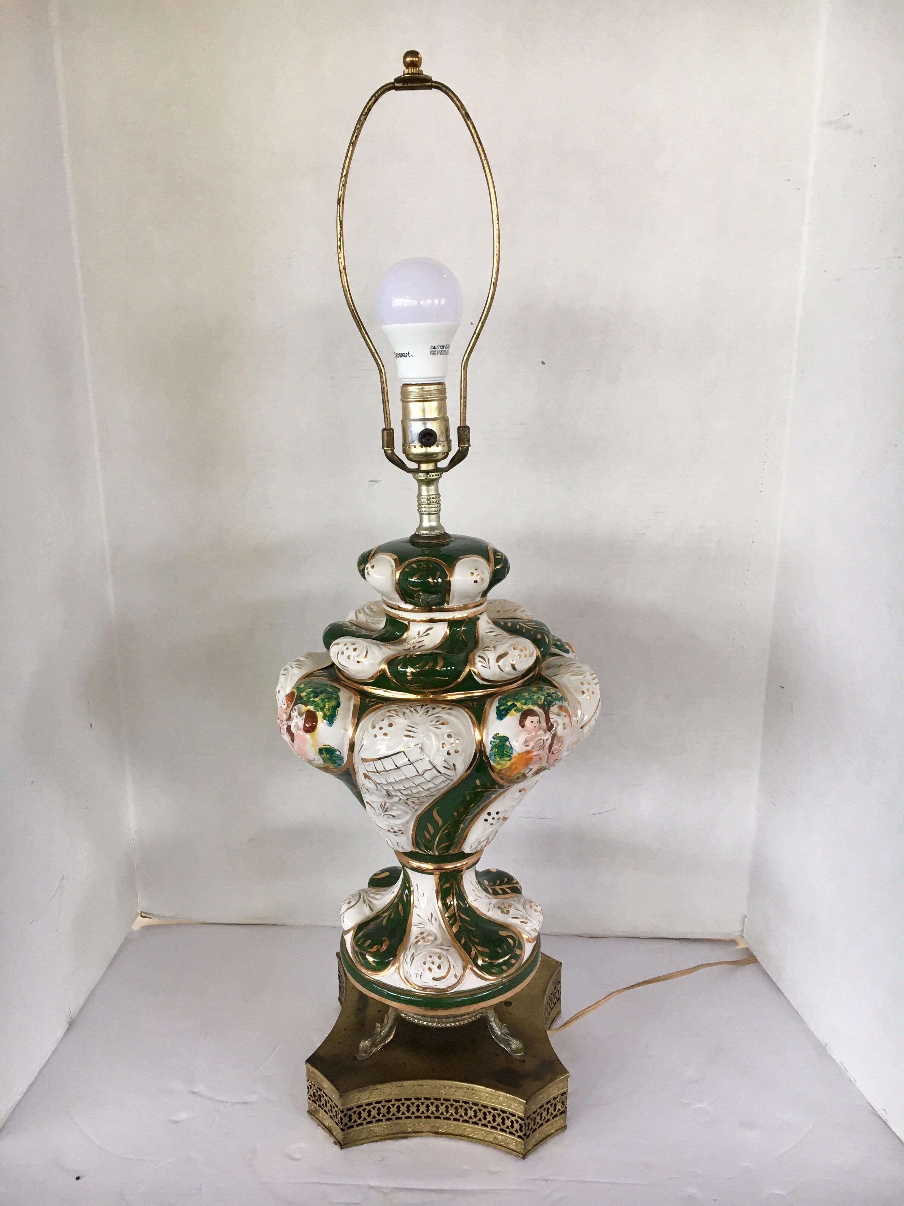 Vibrant ornate table lamp with vivid colors including green. Wired for US and in perfect working order,
circa 1950s Italy.