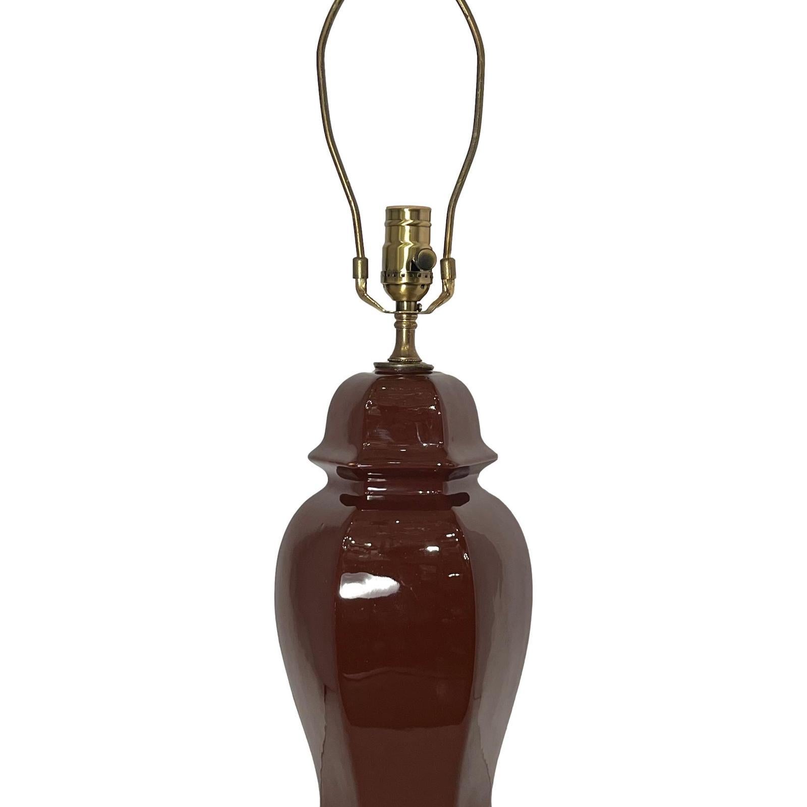 A circa 1960s Italian chocolate brown porcelain table lamp.

Measurements:
Height of body: 15