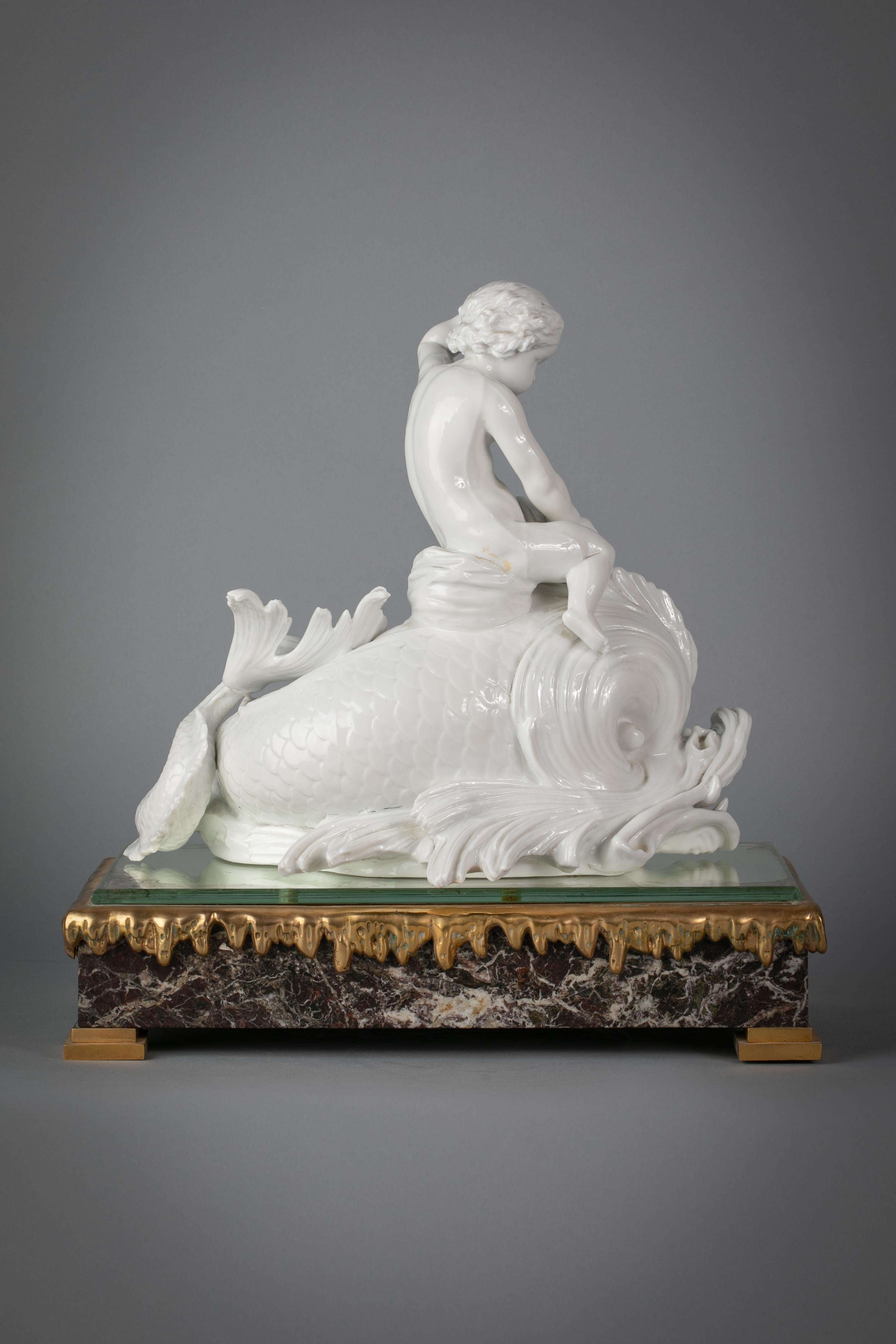 Italian Porcelain white dolphin group on bronze base, Ginori, Circa 1860.