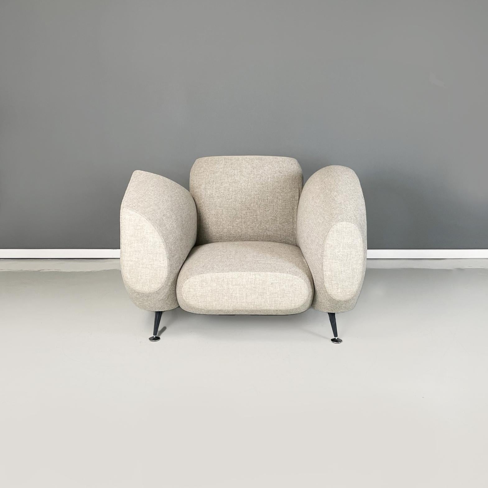 Italian Post-modern Armchair Hotel 21 Lobby by Javier Mariscal for Moroso, 1990-2000s
Armchair mod. Hotel 21 Lobby with asymmetrical geometric profile padded and upholstered in white-beige fabric. The backrest and one armrest have a rounded shape,
