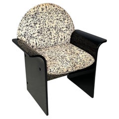 Italian Post-Modern armchair in lacquered black wood and graphic fabric, 1980s