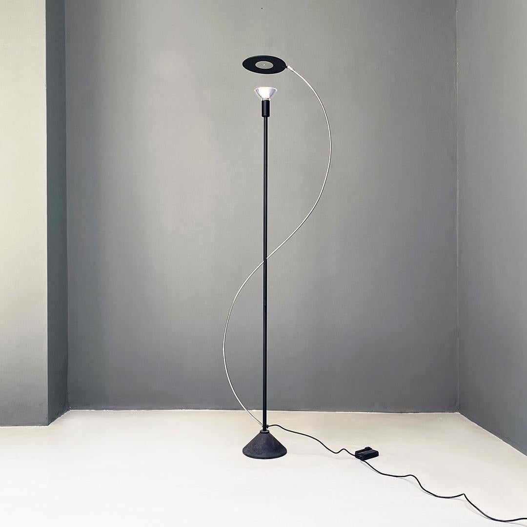 Italian post modern black metal and steel floor halogen floor lamp, 1980s
Floor lamp with conical base, central black metal stem which intersects a second steel rod in the shape of an 