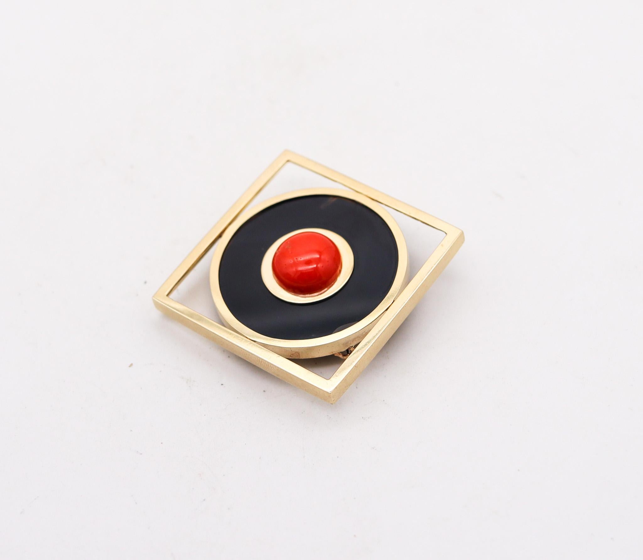Italian convertible pendant brooch with coral.

A very versatile convertible pendant and brooch, created In Italy during the post modernism period, back in the 1980. It was crafted in solid yellow gold of 18 karats with high polished finish and is