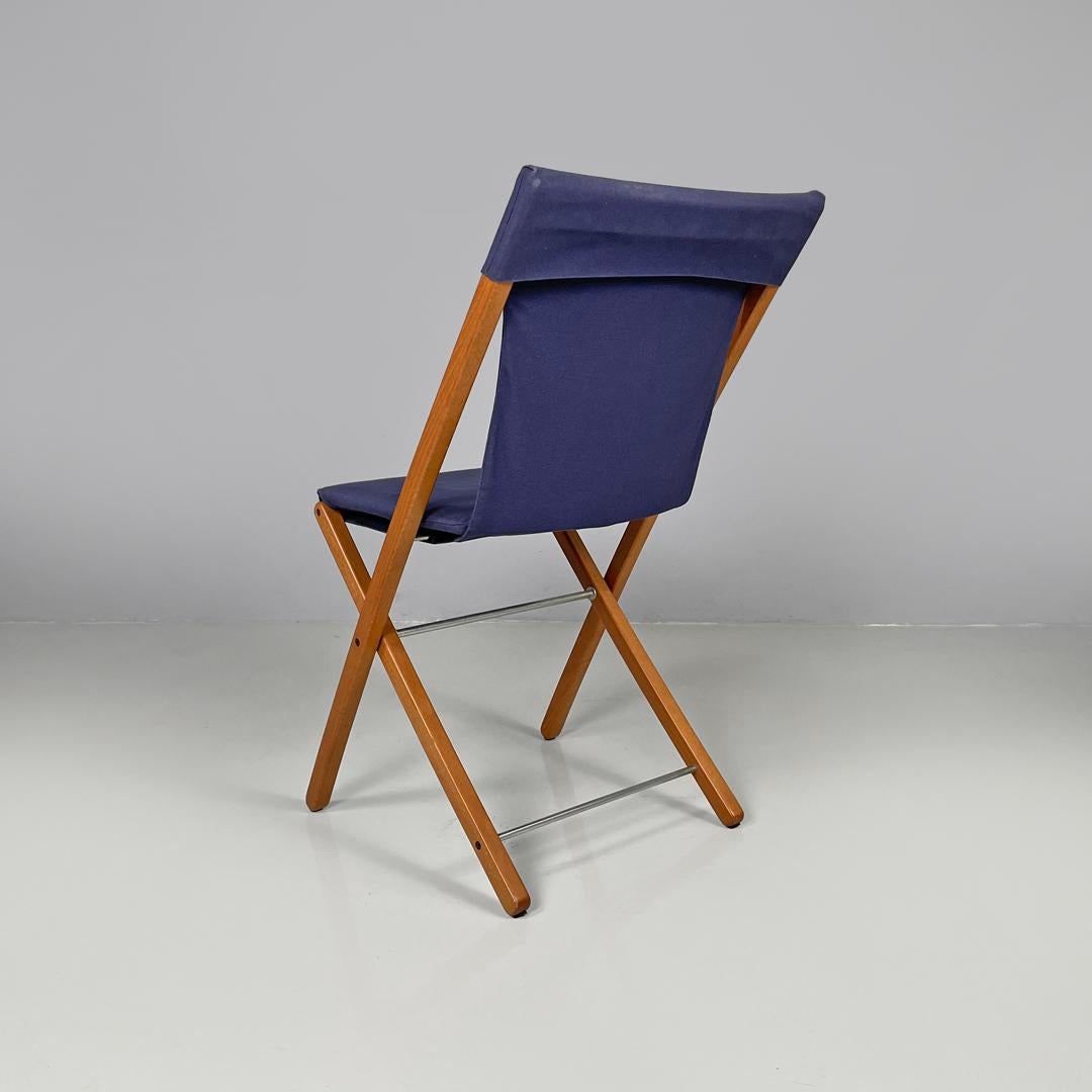 Late 20th Century Italian post modern folding chair in wood and blue fabric structure, 1990s For Sale