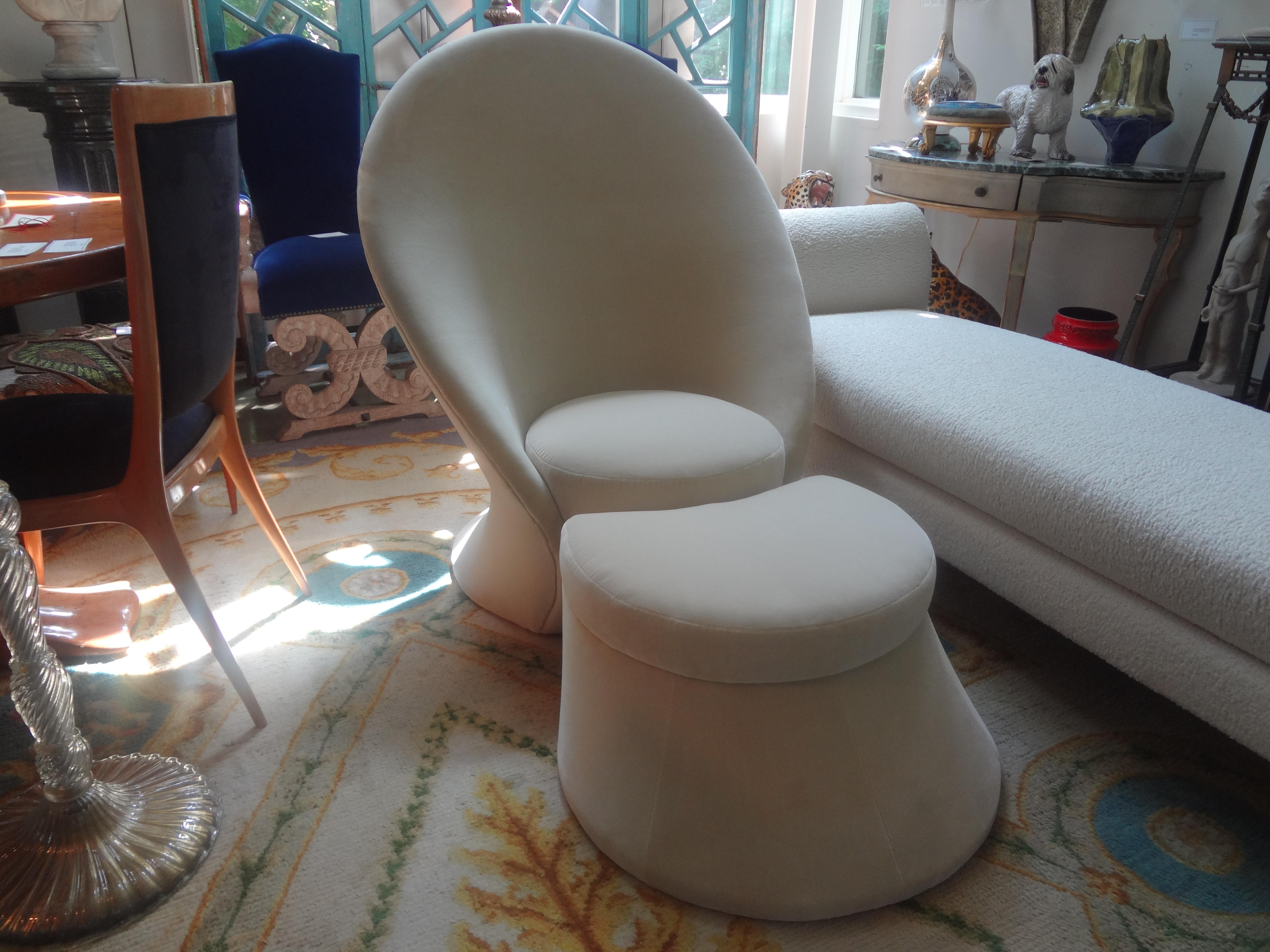 Italian Gio Ponti inspired sculptural chair and ottoman. This stunning Italian modern design set consists of a scooped out chair and appropriately accompanying ottoman. Extremely comfortable and recently upholstered in a neutral low pile mohair