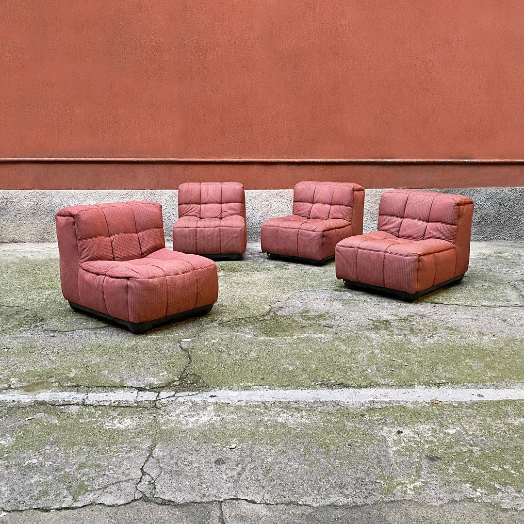 Italian post modern in shades of pink fabric and black abs four pieces modular sofa, 1980s
Four-module sofa with cotton upholstery with a squared pattern in shades of pink, similar to some productions by Gaetano Pesce. Checked stitching on all
