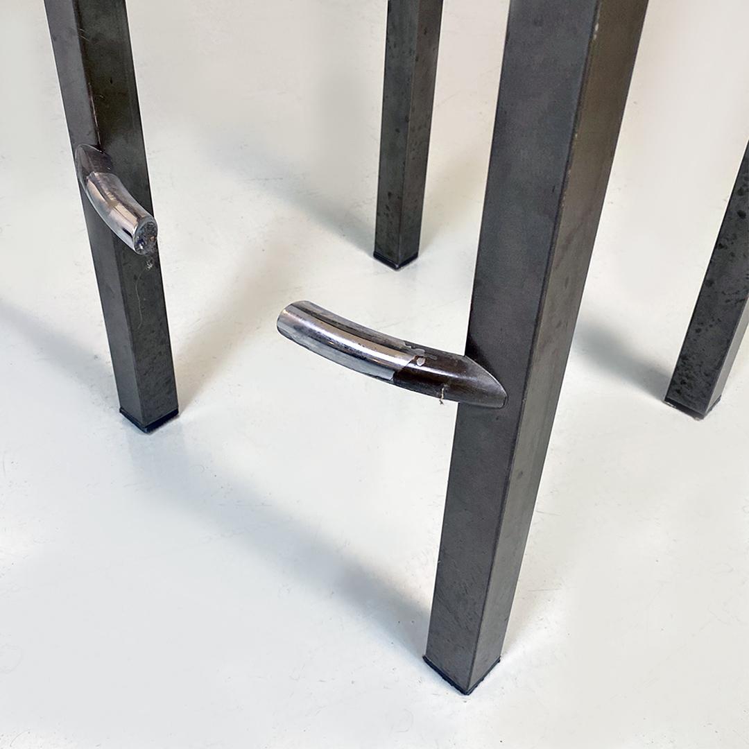 Italian post modern iron counter stools by Philippe Starck for Ycami, 1980s.
Counter stools with totally iron structure with footrest, square section legs, micro-perforated seat and curved backrest.
Designed by Philippe Starck for Ycami, 1980