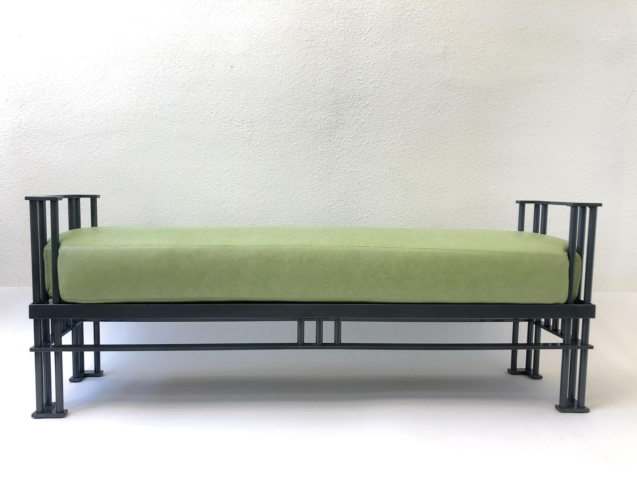A spectacular 1980s Italian Postmodern bench. The bench is constructed of steel that’s powder coated in a metallic gray and the cushion is a soft light green leather. This bench came out off a Steve Chase project in Rancho Mirage.  

Dimension: