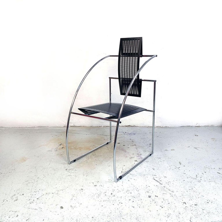 Italian post modern metal Quinta 605 armchair by Mario Botta for Alias, 1980s
Quinta 605 armchair with seat and back in black micro-perforated metal and with curved armrests in chromed metal rod.
Produced by Alias ??on a design by Mario Botta, 1980