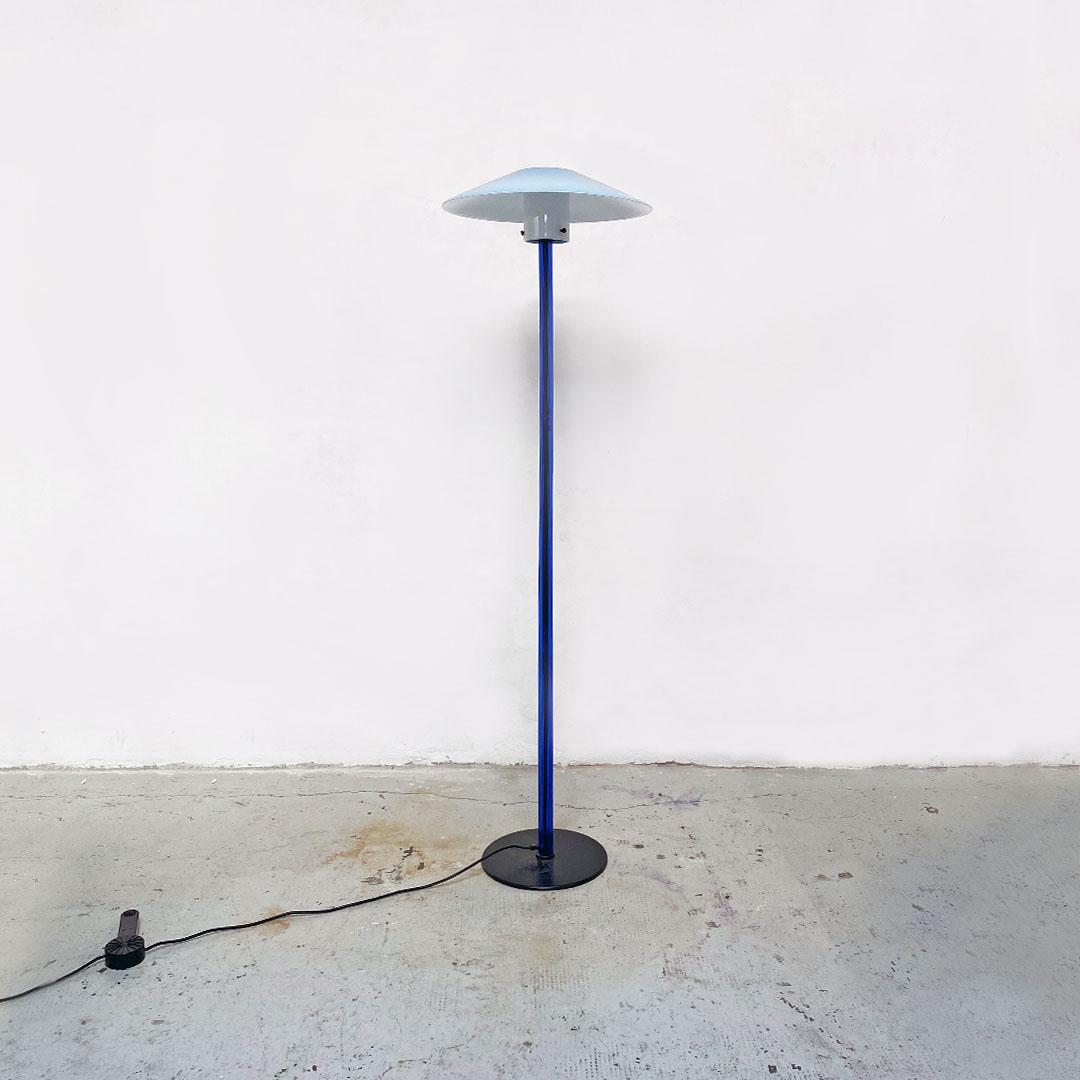 Italian post modern Murano glass Chiara lamp by Cini Boeri for Fontana Arte, 1980s
Chiara model floor lamp with round metal base, stem in fluted blue Murano glass and lampshade in opaline Murano glass white inside and blue outside.
Produced by