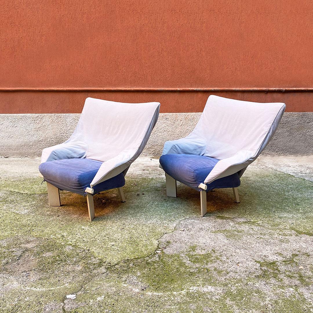 Italian post modern pair of wood and grey-blue fabric armchairs, 1980s
Armchairs with staggered wooden legs painted in cream white, high back in gray cotton canvas, both on the front and on the back and seat in blue entirely in original fabric of
