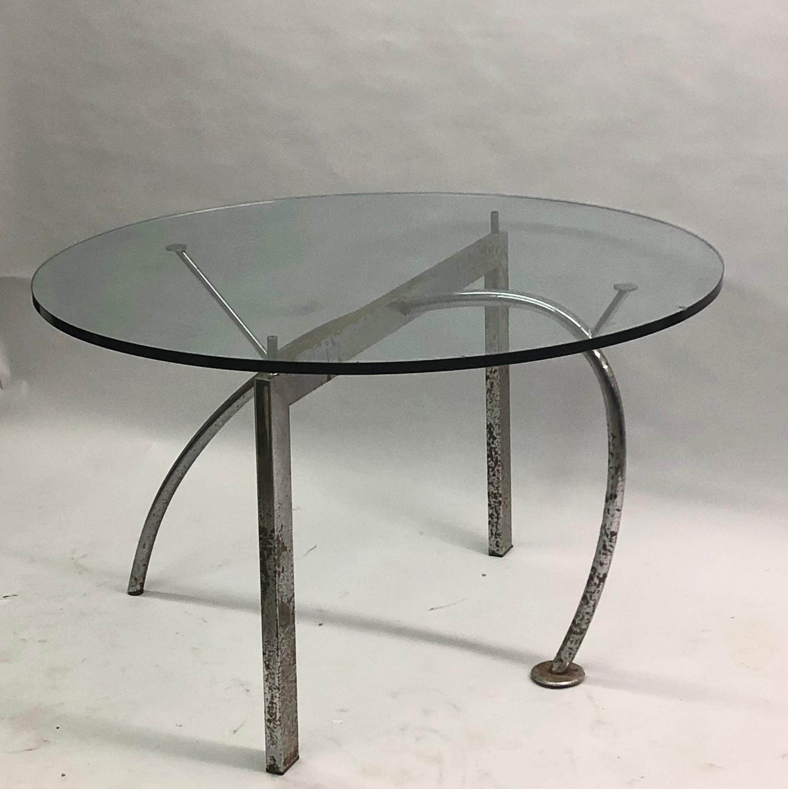 Rare and important Italian Post Modern dining table base by the legendary Memphis designer, Massimo Iosa-Ghini. The table is a prototype from a small edition and a prime example of the designer's early Bolidist architecture and design. Iosa Ghini is