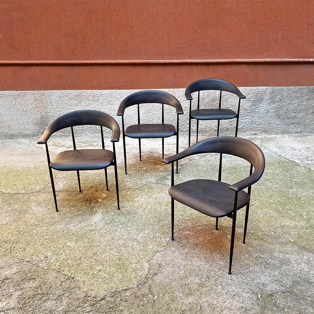 Italian post modern set of black metal and faux leather cockpit chair, 1980s.
Set of four cockpit chairs in black metal rod, with upholstered seat and back upholstered in rough matt black sky.
1980s
Good general conditions, some signs on the