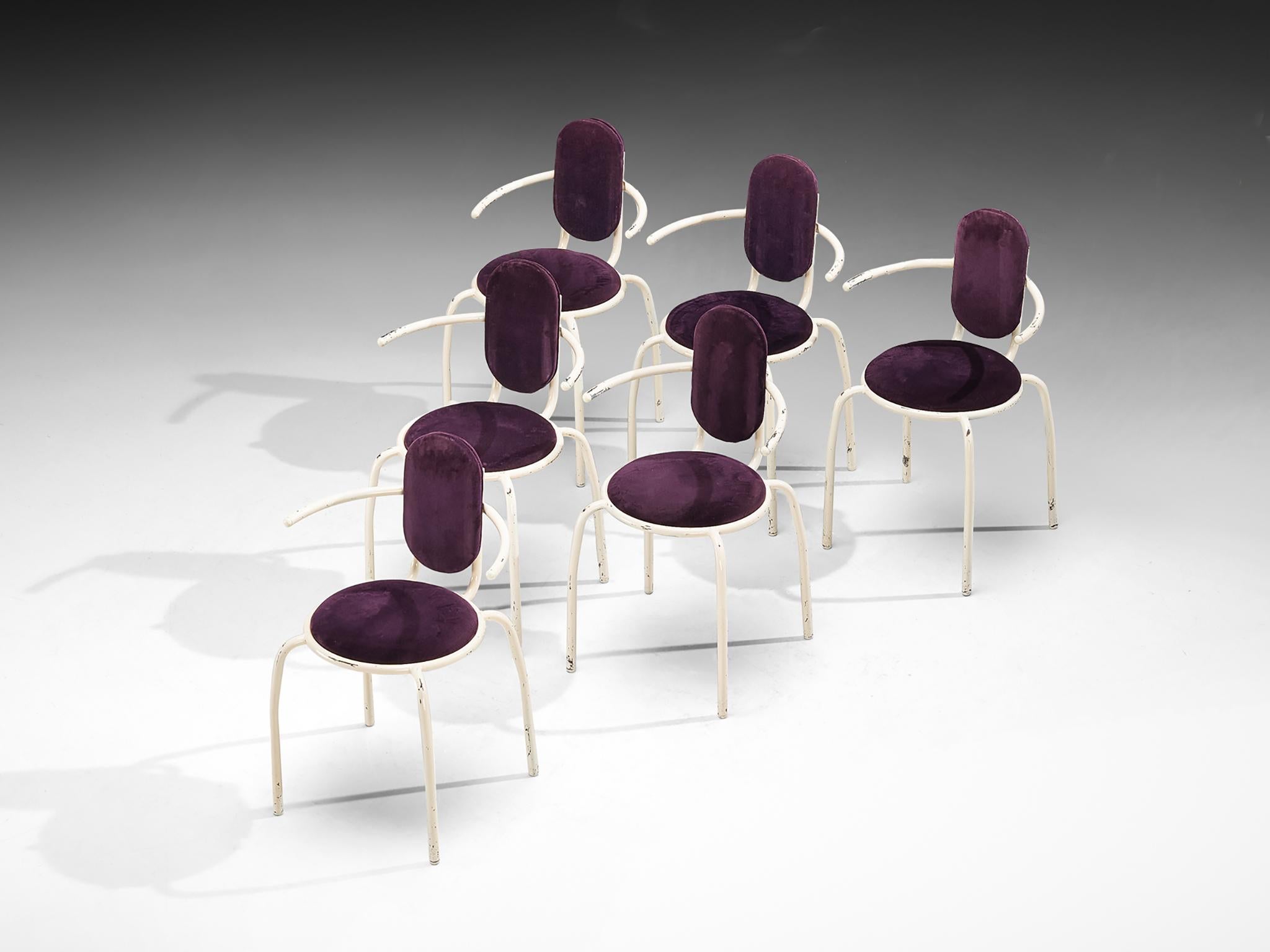 Set of six dining chairs, corduroy fabric, lacquered steel, Italy, 1980s

A Memphis-inspired design defined by an interplay of curved and linear elements, creating a composition that is both fluid and dynamic. The frame consists of slender tubular