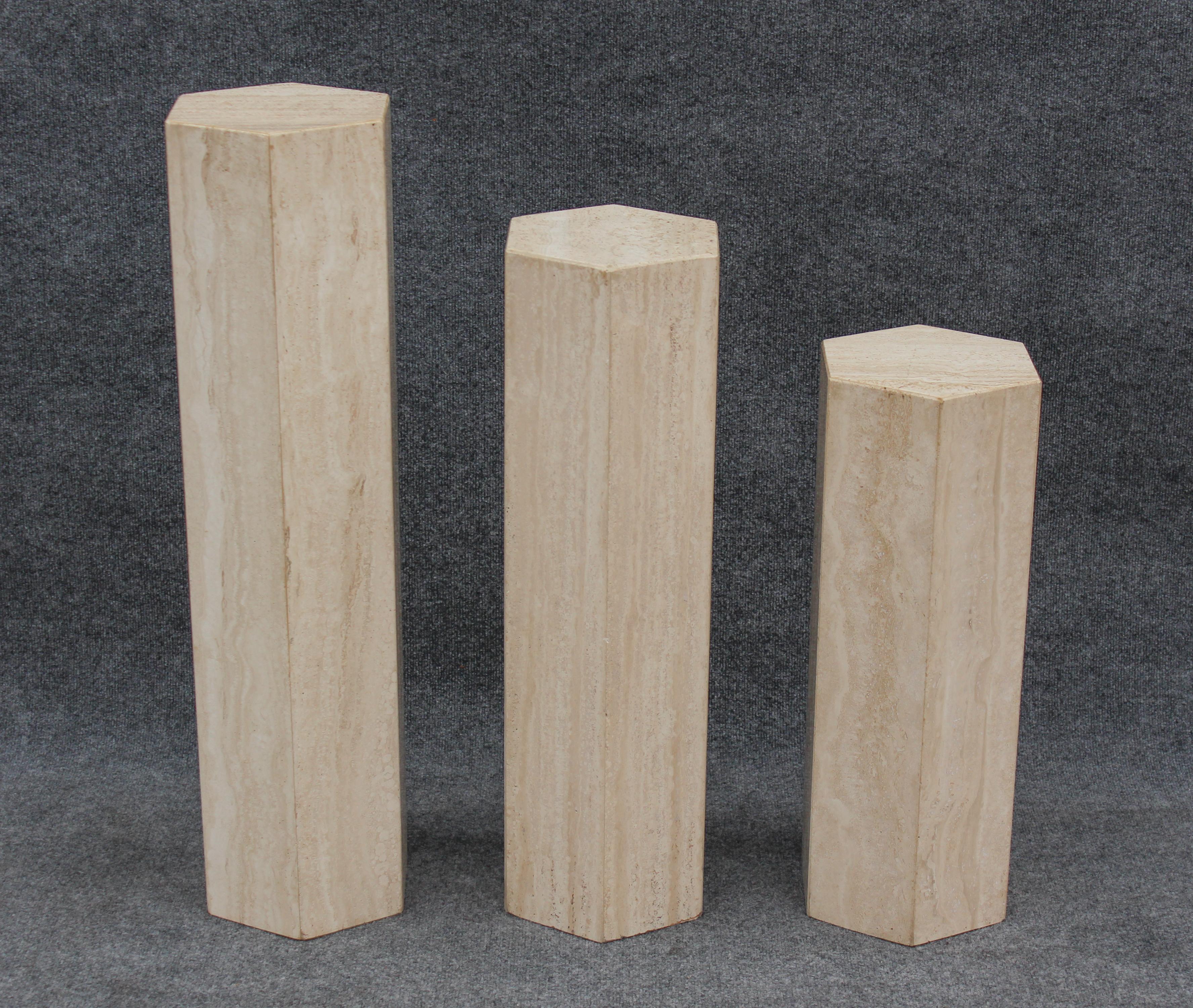 In the style of Stone International, this matching set of travertine pedestals share the excellent construction quality common of Italian products, but a more dynamic design than many others. The maker evidently took great care in choosing the