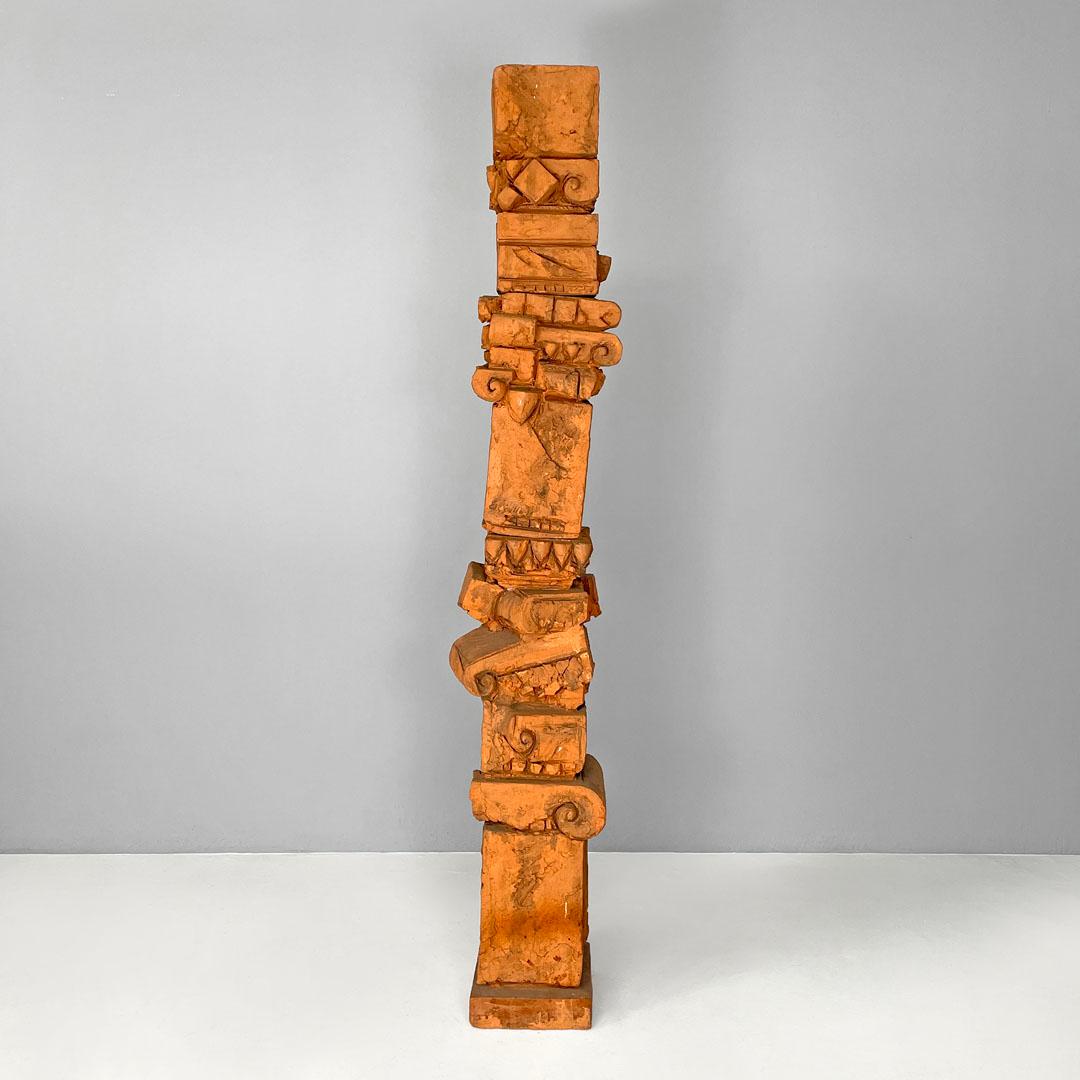 Italian post-modern terracotta sculpture by Edmondo Cirillo, 1991
Sculpture with a square base in terracotta, it develops in height and resembles a totem. The sculpture is modeled with geometric and decorative shapes, which in many points recall the