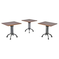 Italian post modern wooden top and decorated black cast iron bar tables, 1990s